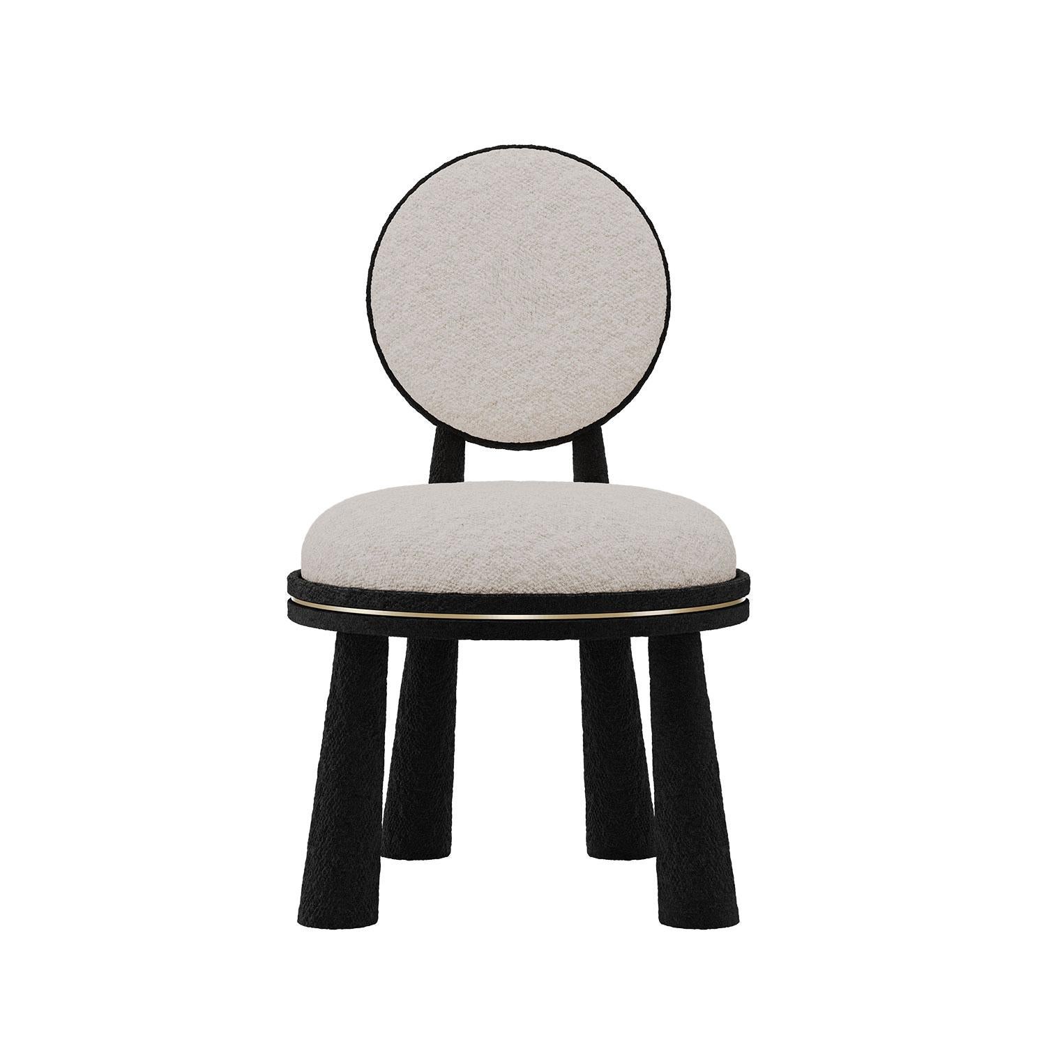 Designed and handmade in Portugal, the Mouline Chair has a bold, fun, and playful essence. Its backrest echoes the circular seat shape, creating a cohesive visual rhythm. Robust, turned legs give the Mouline Chair a grounded presence, while the