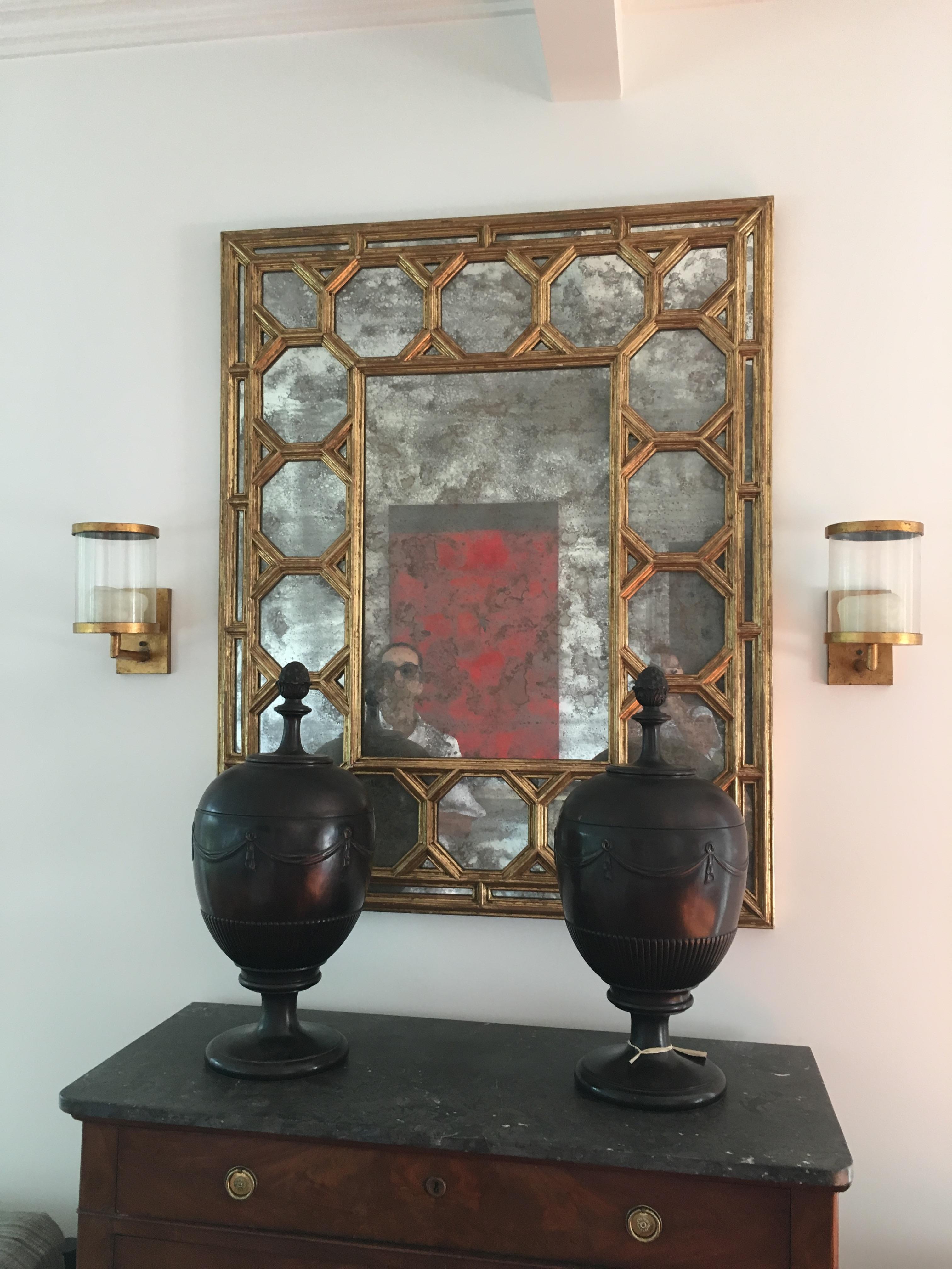 21st century gilded mirror with octagonal design with antiqued glass.

Provenance: Private estate, Southampton, NY; 
Mecox Gardens