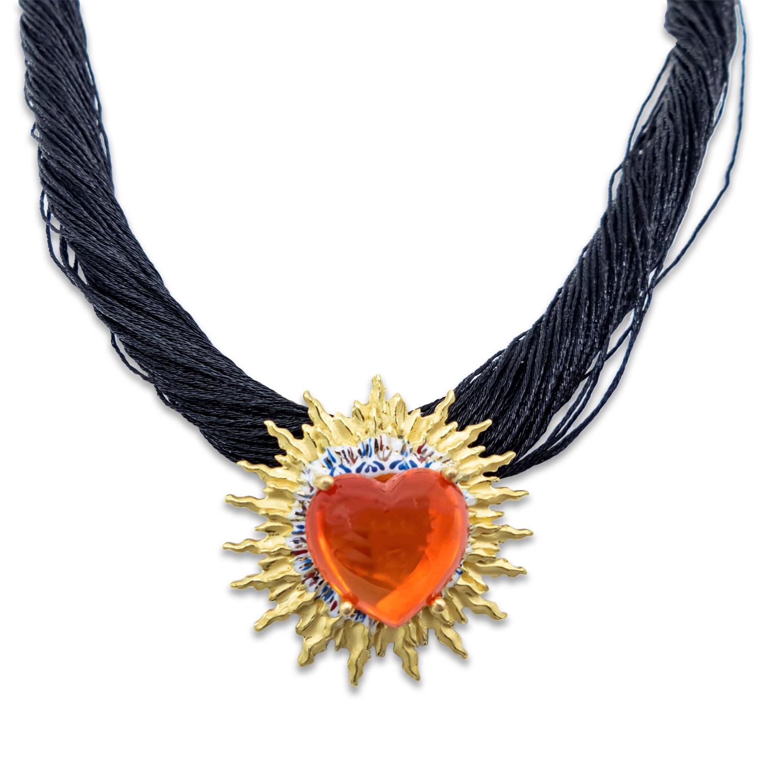 21st Century 18 Karat Yellow Gold Necklace Heart Fire Opal Fire Enamel Star Spanish Mystic  

18 Karat Gold necklace with fire enamels and a 16'33 cts fire opal carved in the shape of a heart (17 mm x 17 mm) with black silk threads and magnet