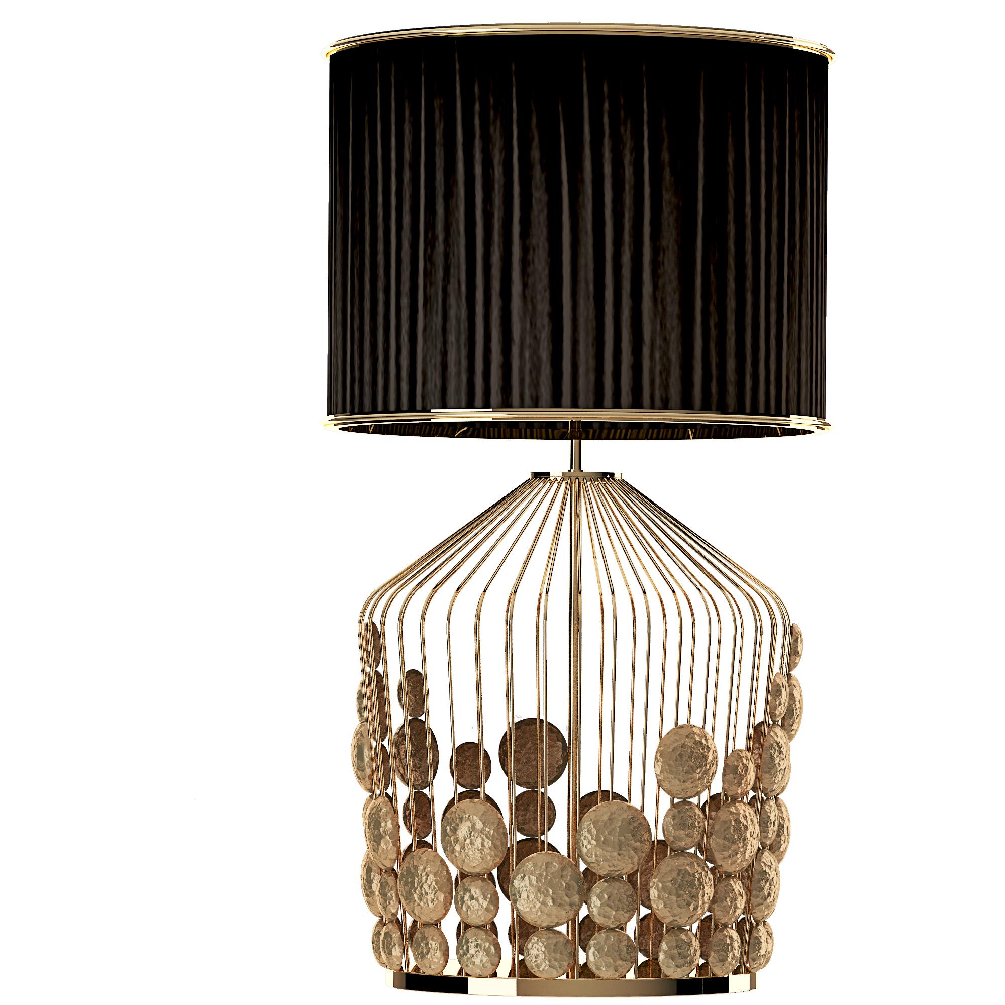 Grapes modern lamp is a nature inspired contemporary lighting piece. Its light flows through the organza silk shade, reflecting off the hammered gold-plated brass medallions and bringing the same sense of refined luxury as if you were opening a