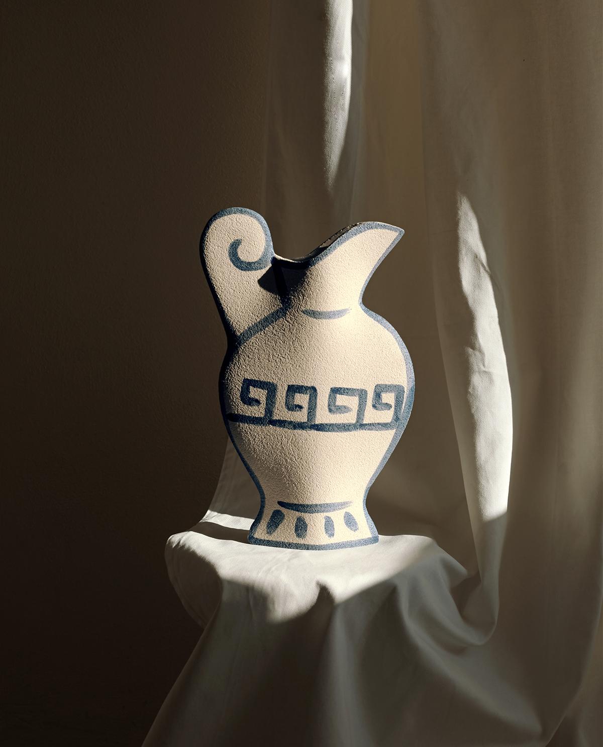 A part of a captivating new line blending ancient Greek pottery with contemporary design, the ‘Greek Pitcher N°2’ vase showcases delicate blue underglaze illustrations that harmonize traditional and modern aesthetics.
Crafted by our designer, the