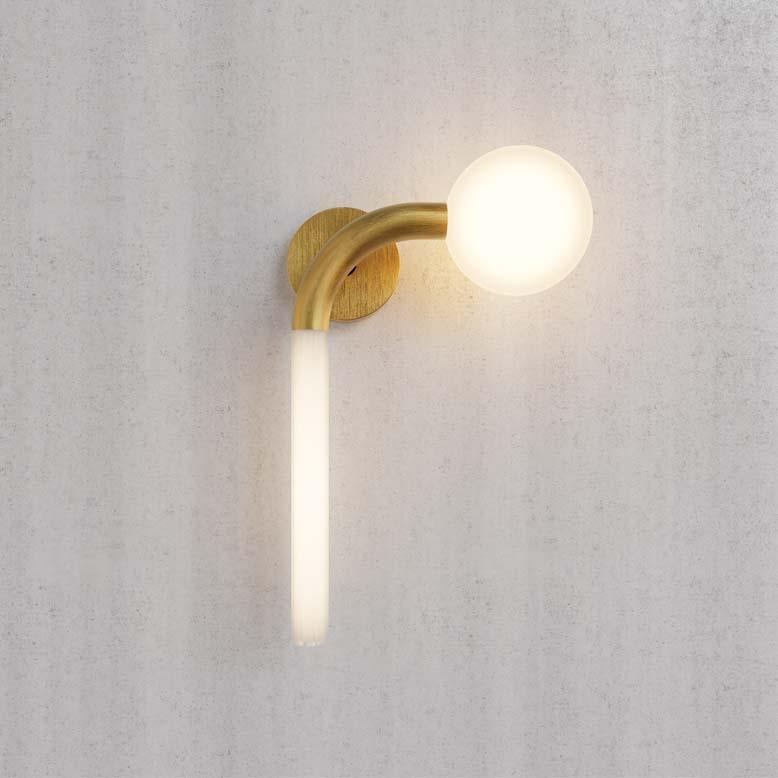 1-light wall lamp in golden brass and clear glass tubes and sphere. Each object is handcrafted and the care for every detail makes each item unique in its kind. It can be combined with the 8-light chandelier, thus making the environment refined and