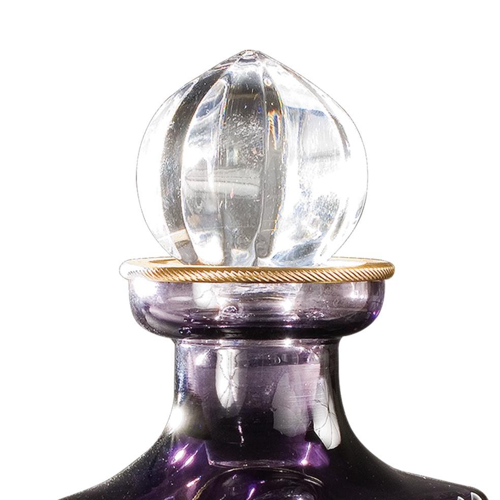21st century Hand carved amethyst crystal and golden bronze whisky bottle. This bottle is finely chiseled lost wax castings . On request to customer can modificate the color of crystal: pink, amber, amethist etc... and we can change also the metal