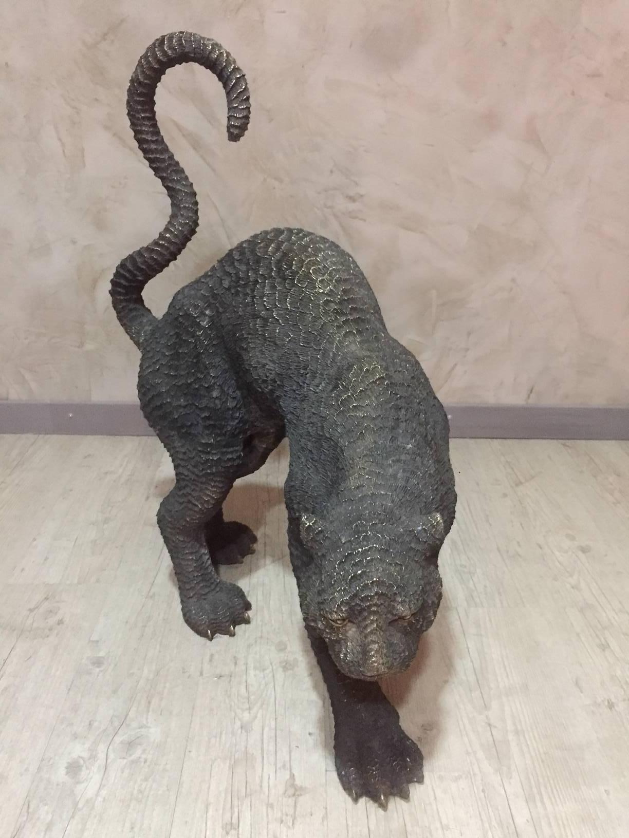 Life size, hand-carved black bronze panther sculpture. Cizeled bronze.