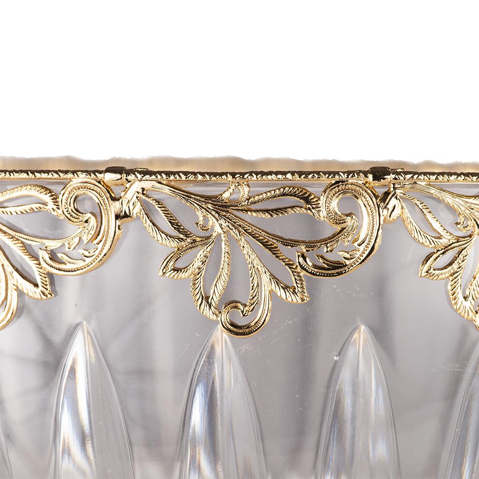 21-st century hand carved clear crystal centrepiece with golden bronze frame.
This centrepiece is a limited edition, we have only a piece. It's particular hand -carved and the frame is in silver colorated in antique gold. Each object is handcrafted