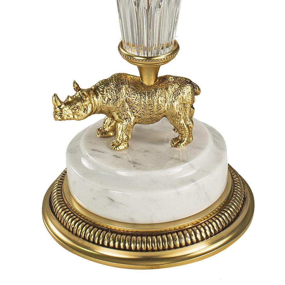 21st Century hand carved clear crystal and golden bronze vase. This vase is finely chiseled lost wax castings and hand-grounded crystal. The golden bronze rhinoceros on the base was created with the lost wax technique and has been finely chiseled to