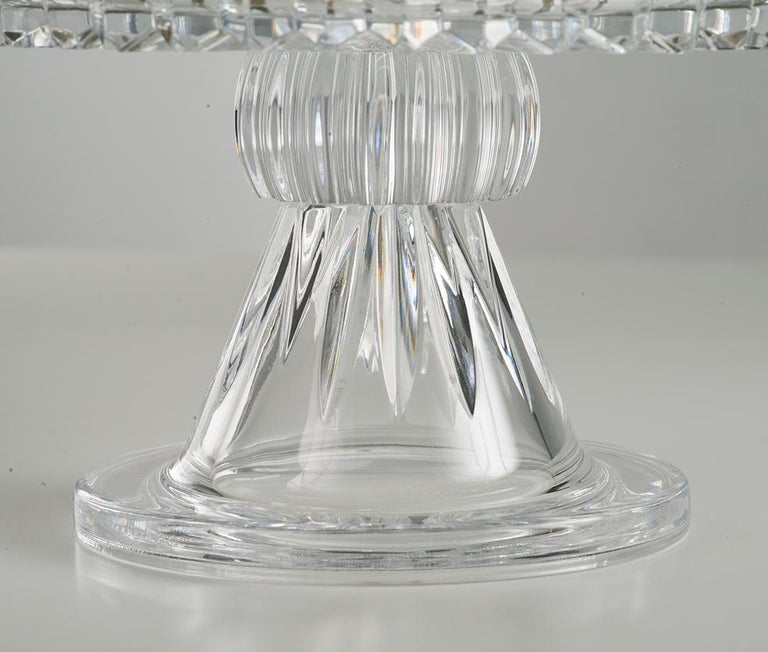 21-st century hand carved clear crystal centrepiece with silver925 frame (gr 185). 
This centrepiece is a limited edition, we have only a few pieces. It's particular hand -carved and the frame is in silver colorated in antique gold. Each object is