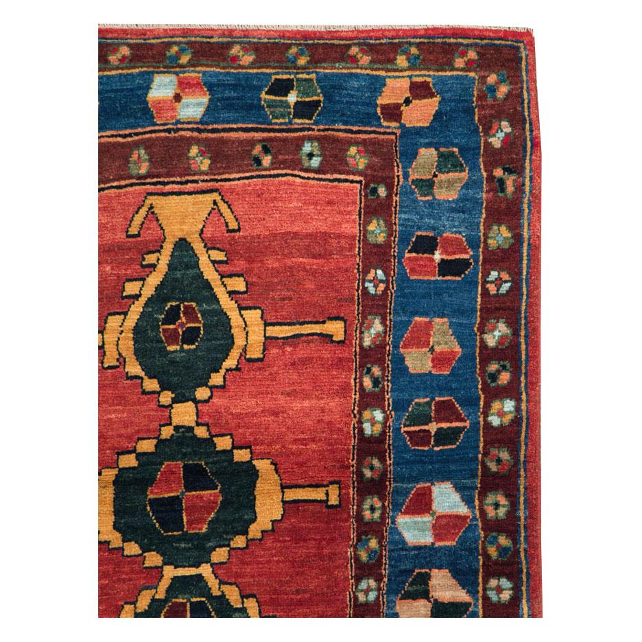 A modern Persian Gabbeh throw rug handmade during the 21st century.

Measures: 3' 5