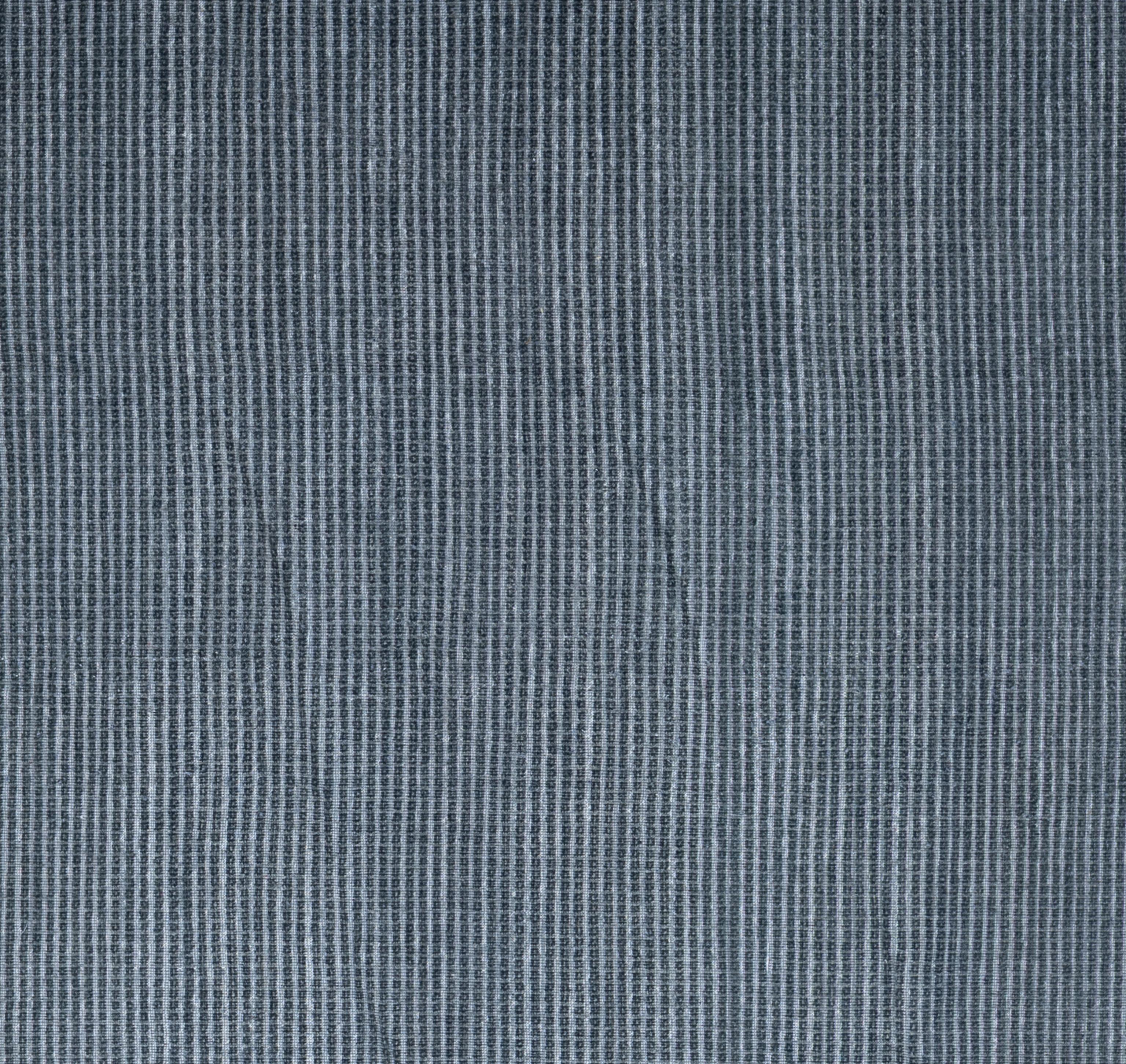 Ce tapis tribal n'est pas seulement un élément de décoration ; c'est une tapisserie culturelle imprégnée d'histoires et d'héritage. Au-delà de son attrait visuel, ce tapis sert de pont entre le passé et le présent, honorant les techniques