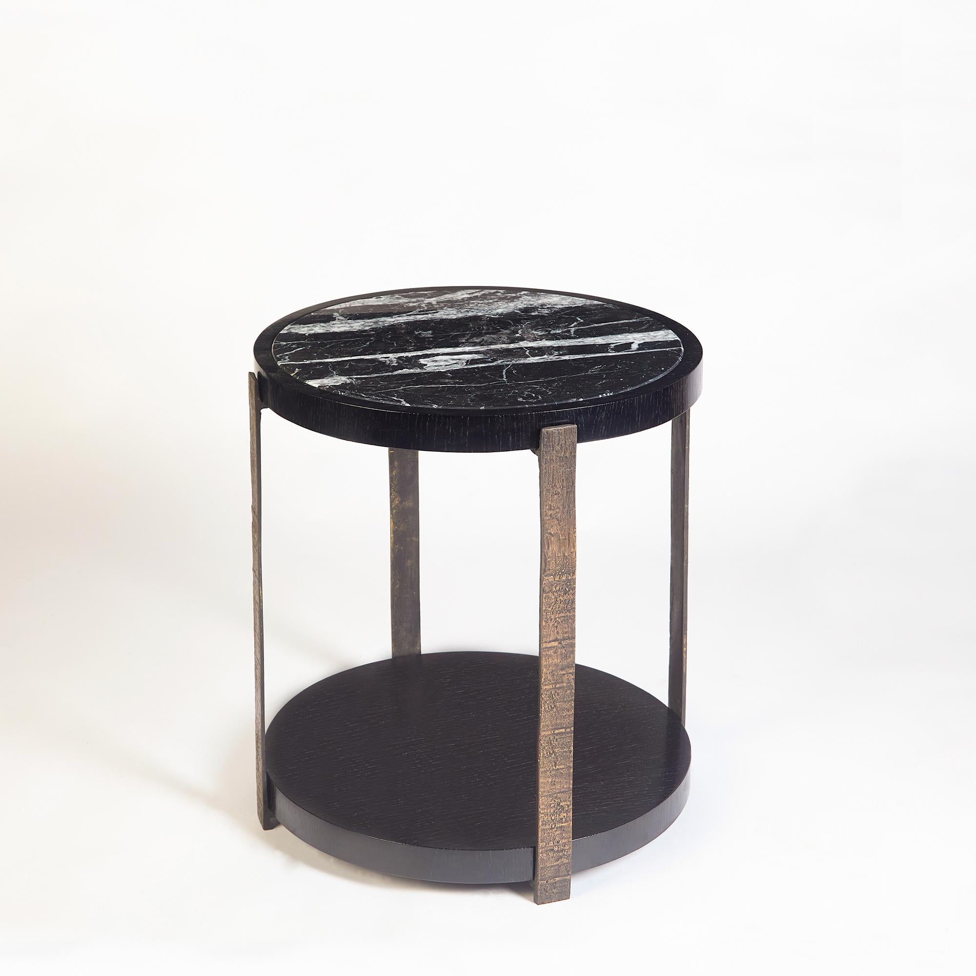 Ida Side Table, Sand Brushed Black Oak and Nero Marquina Marble Top by Duistt

The Ida collection is a luxurious set of two upholstery pieces and a side table. They all feature sand brushed black oak finish and carved bronze details.

Shown in sand