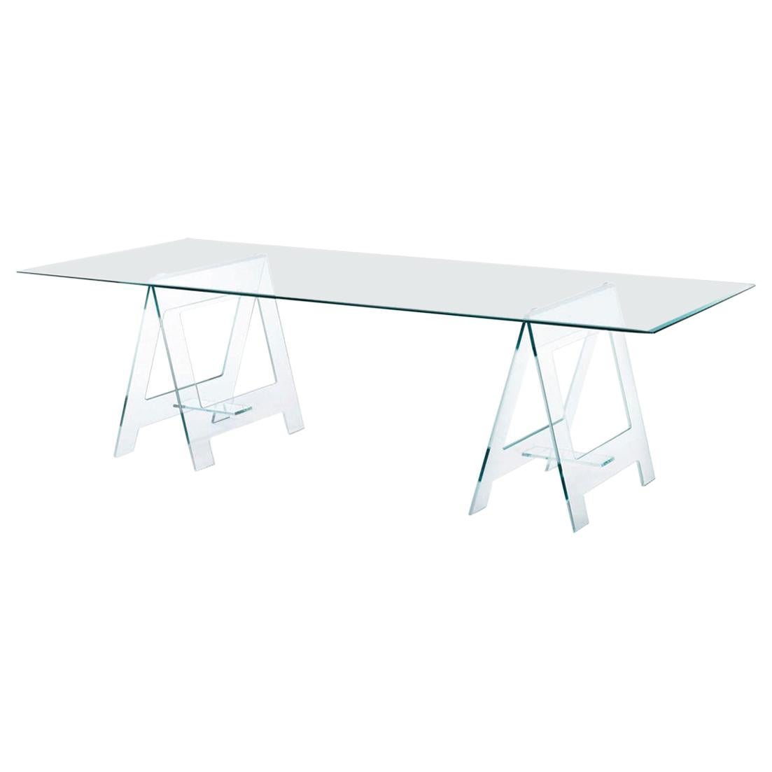 This is a very eclectic table cause it's unusual form with its top on a pair of easels made in clear crystal; it's an important table or desk but at the same time it’s a very light presence in a room.

The Italian design gives a touch of modernism