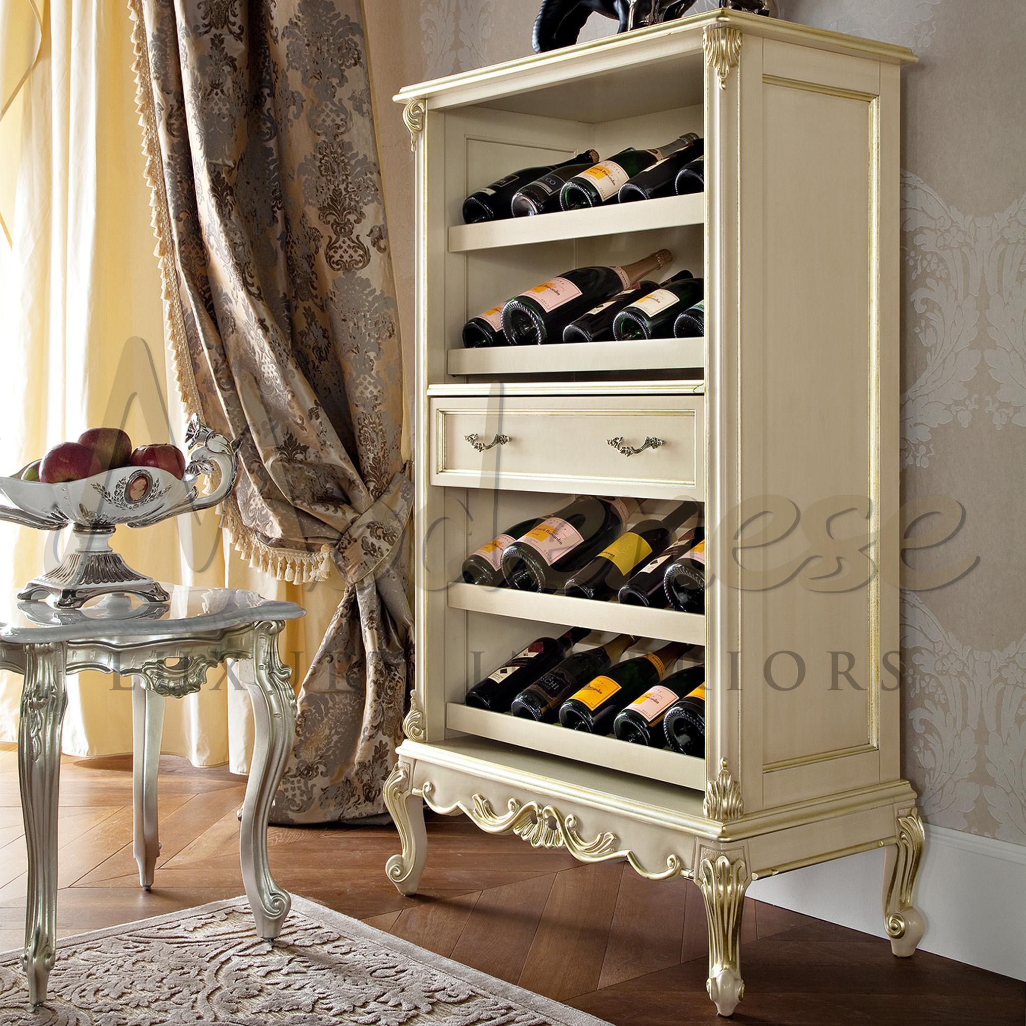 A lot more than just normal furniture, this bottle rack features one drawer and four shelves capable of holdingat least 30 bottles. Its ivory wood colour is given by a lacquered finish and baroque carved decorations are totally