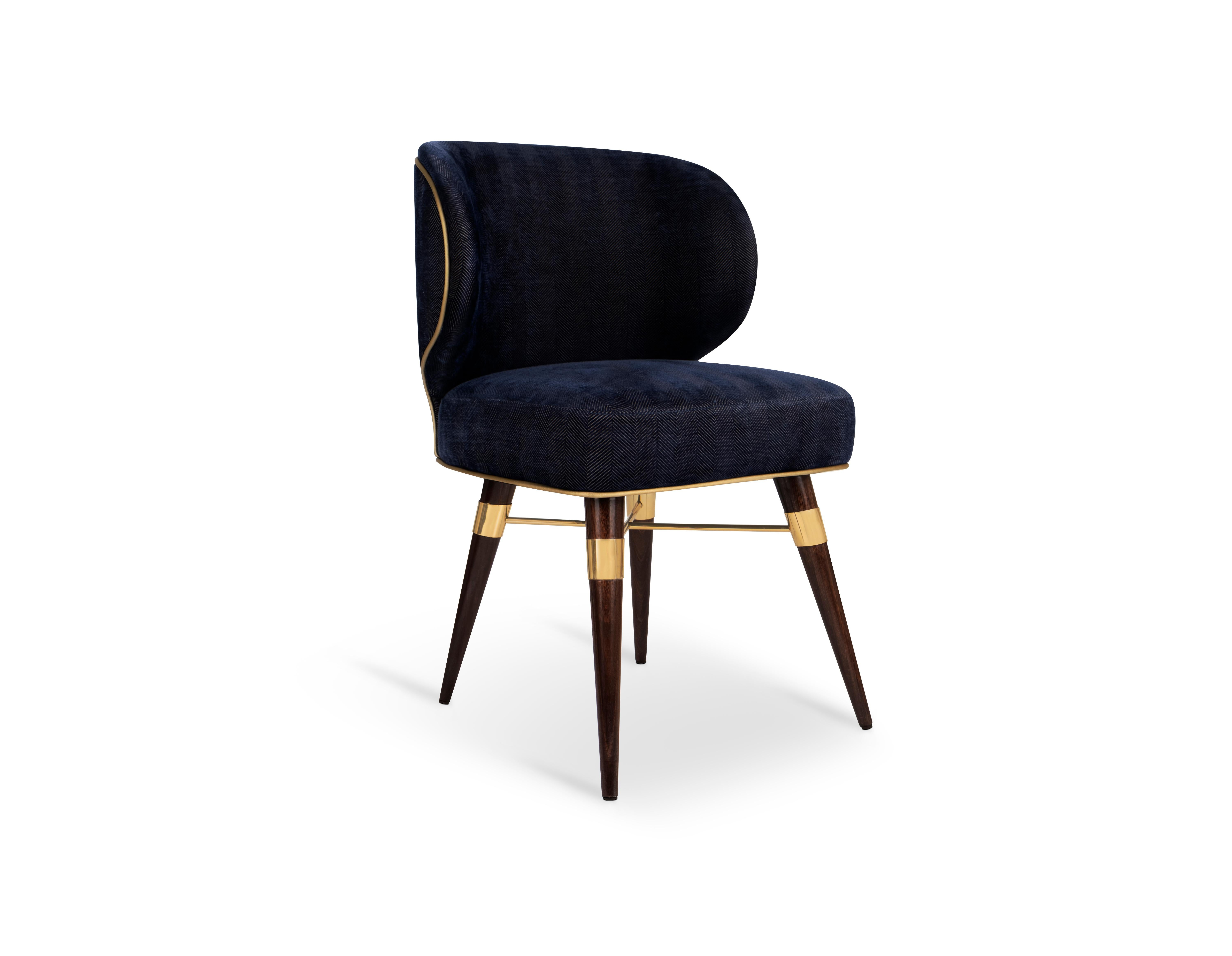 Louis dining chair is one of the Ottiu's bestsellers.

Ottiu designers joined all its forces to create the Louis Mid-Century Modern Dining Chair, combining upholstery in cotton velvet and walnut wood legs. This piece will look perfect in your