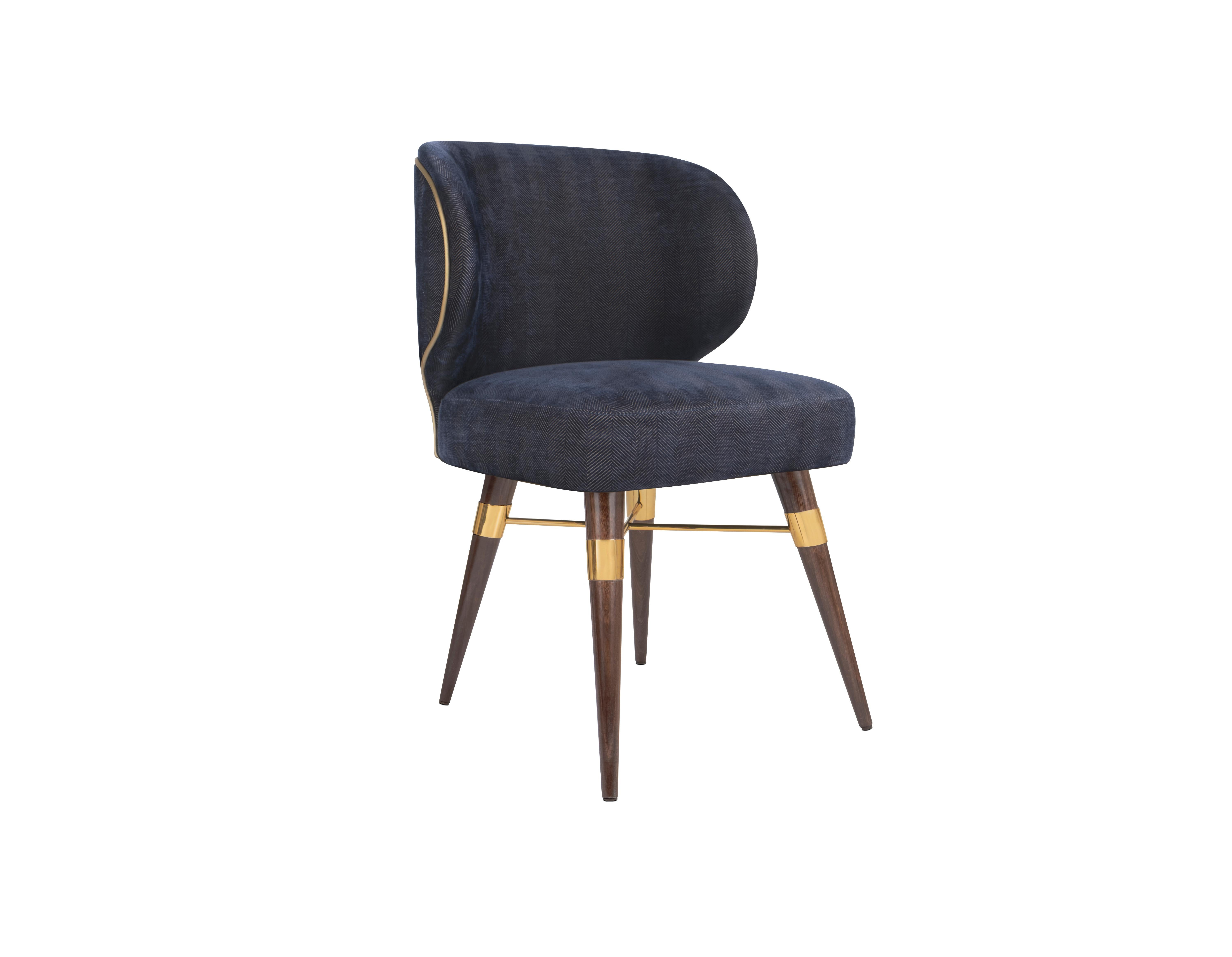 Louis dining chair is one of the Ottiu's bestsellers.

Ottiu designers joined all its forces to create the Louis Mid-Century Modern dining chair, combining upholstery in cotton velvet and walnut wood legs. This piece will look perfect in your