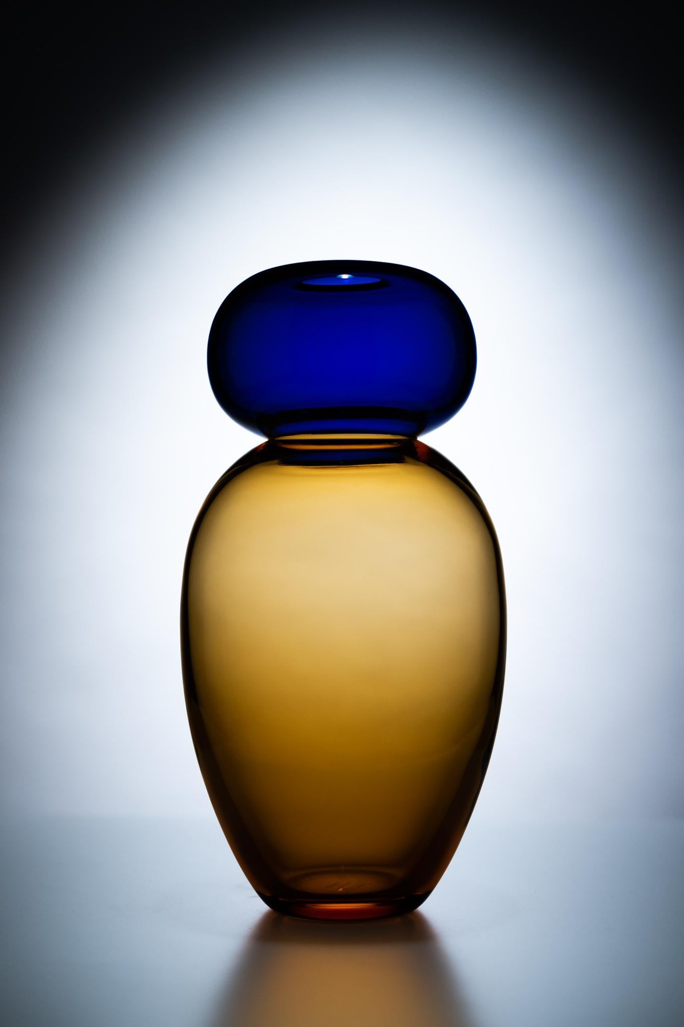 21st century Karim Rashid Queen vase Murano glass various Amber base Blue Top
Queen designed by Karim Rashid is a curvaceous vase that combine regality with visual wit. Proposed in combination with King, the top of Queen resembles a rounded “halo”,