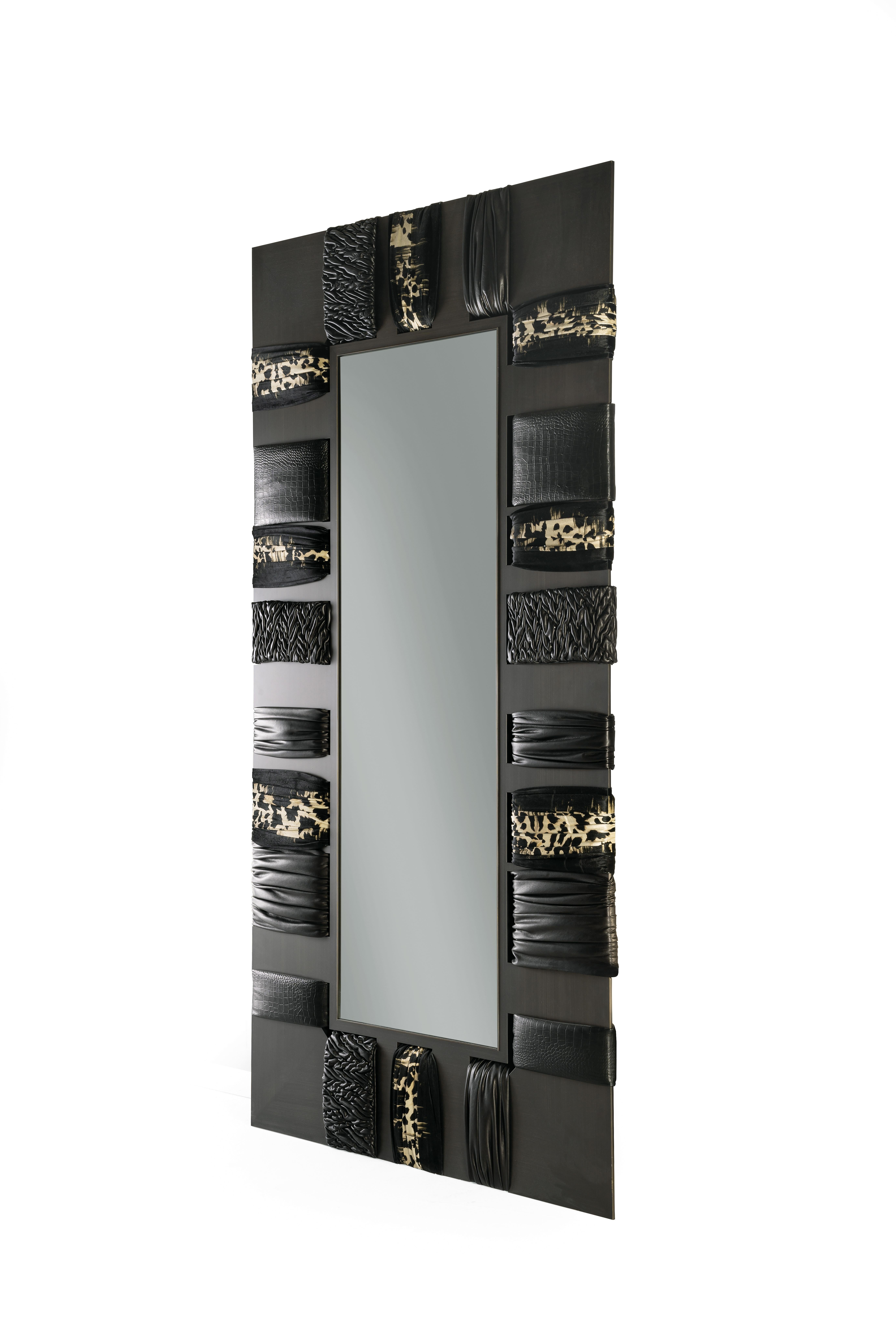 Kelbia standing mirror with structure in MDF, covered on the front with a metal sheet with Brushed Dark Bronze finishing and with decorative elements in leather cat. A Sauvage col. Tenebra with 