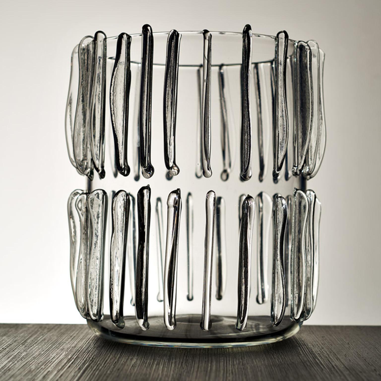 Avallone's sculptural glass vases are unique pieces, individually hand blown by a master-blower in Murano, famed for centuries for its glass production. The artist works firstly on the designs in his Milan studio, before presiding over the blowing