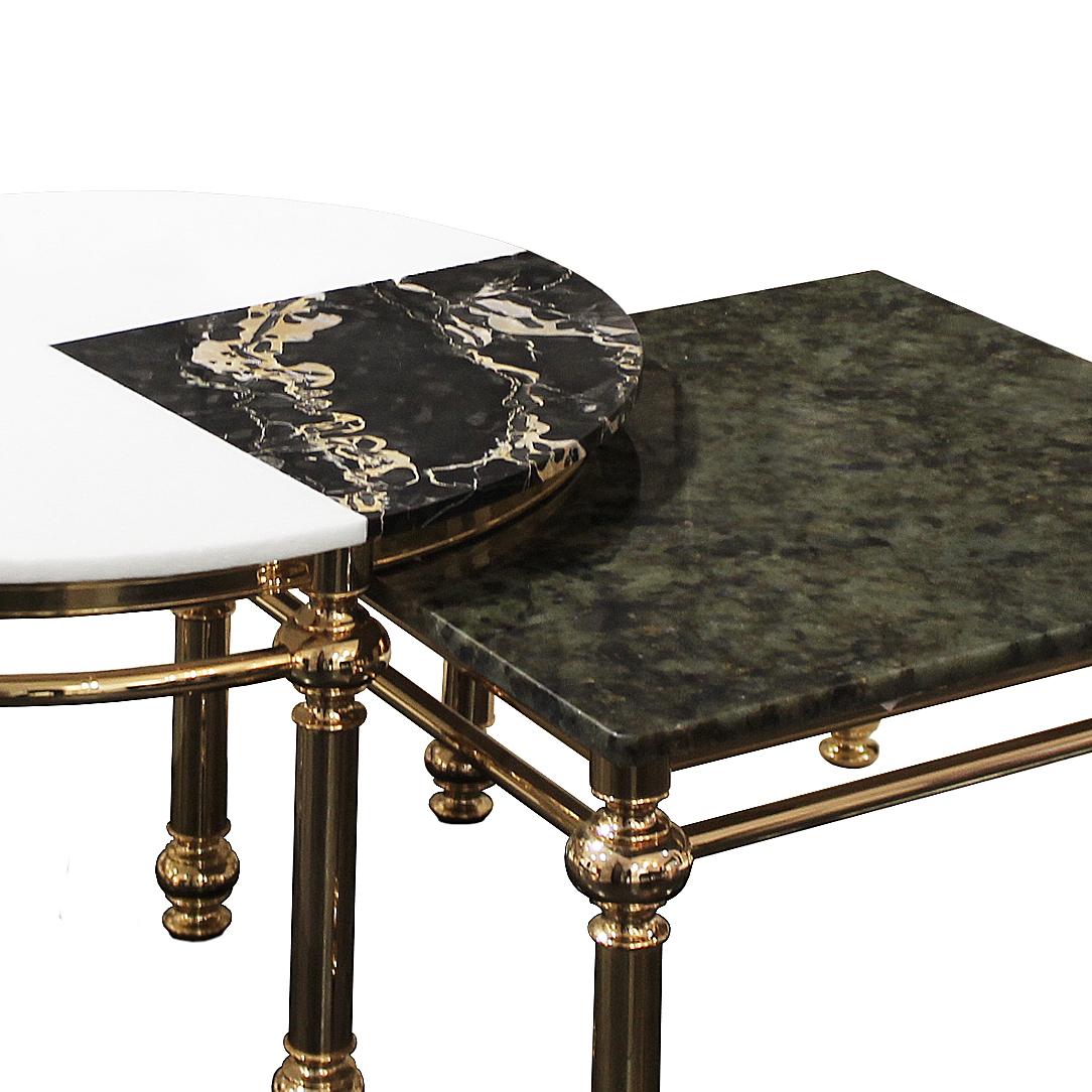 Cocktail tables with gold galvanised brass turned legs and inlaid tops in Labradorite Blue Green, Portoro black marble and White Granite.
Size set: 80D x 48.5 H , 65D x 42,5 H

Designer
Hebanon Studio, product design studio behind the