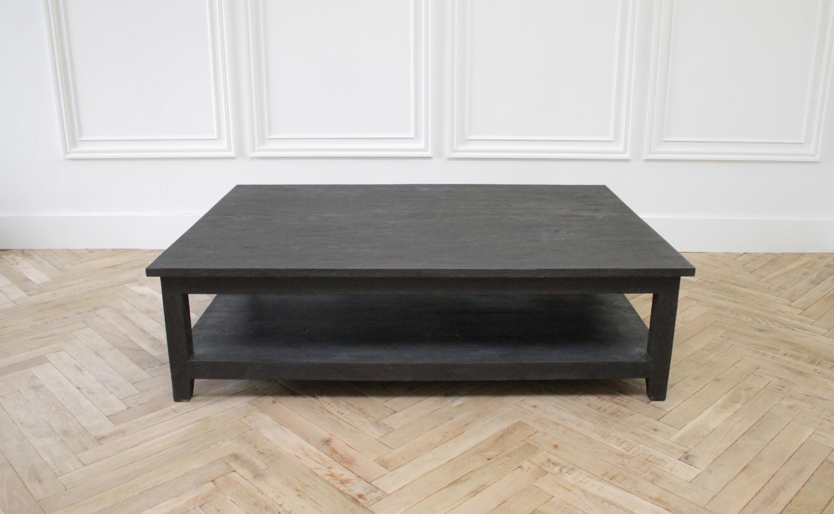 21st century large ebony stained coffee table
Solid wood, top has a distressed lightly hand scraped finish.
Measures: 64