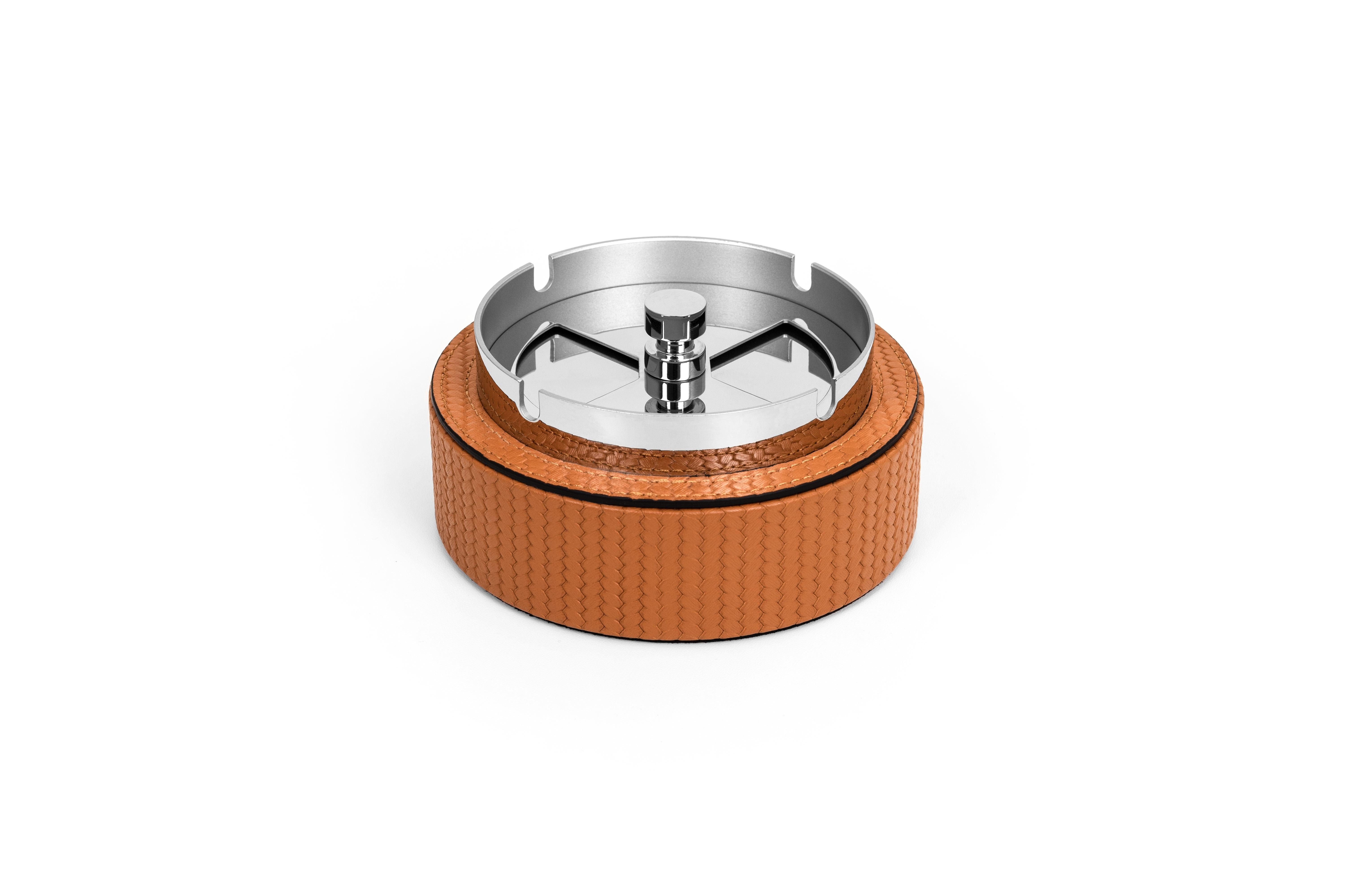 Welcome inside Pinetti smoking accessories collection with Vento ashtray. A stainless steel round revolving ashtray with the properly right spaces to perfectly keep the cigarettes.

Our wind-proof ashtray is beautifully finished with a sleek