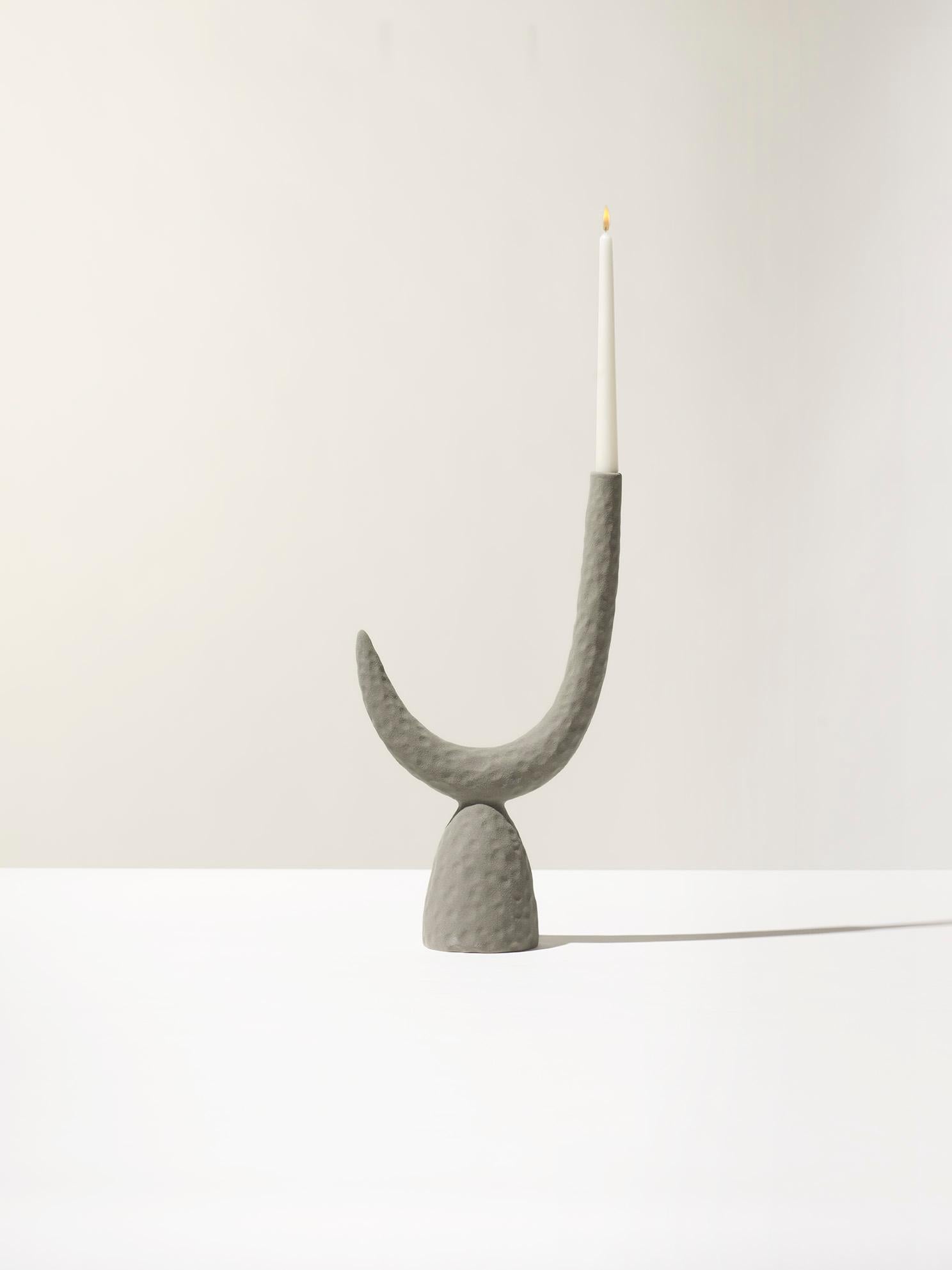 Made in Italy candlestick, in light grey matt color, this pottery peace was designed by Andrea Anastasio at the historical Bottega Cercamica Gatti 1928 in Faenza, Italy, specialized on creating ceramic art, that goes perfect for people passionate on