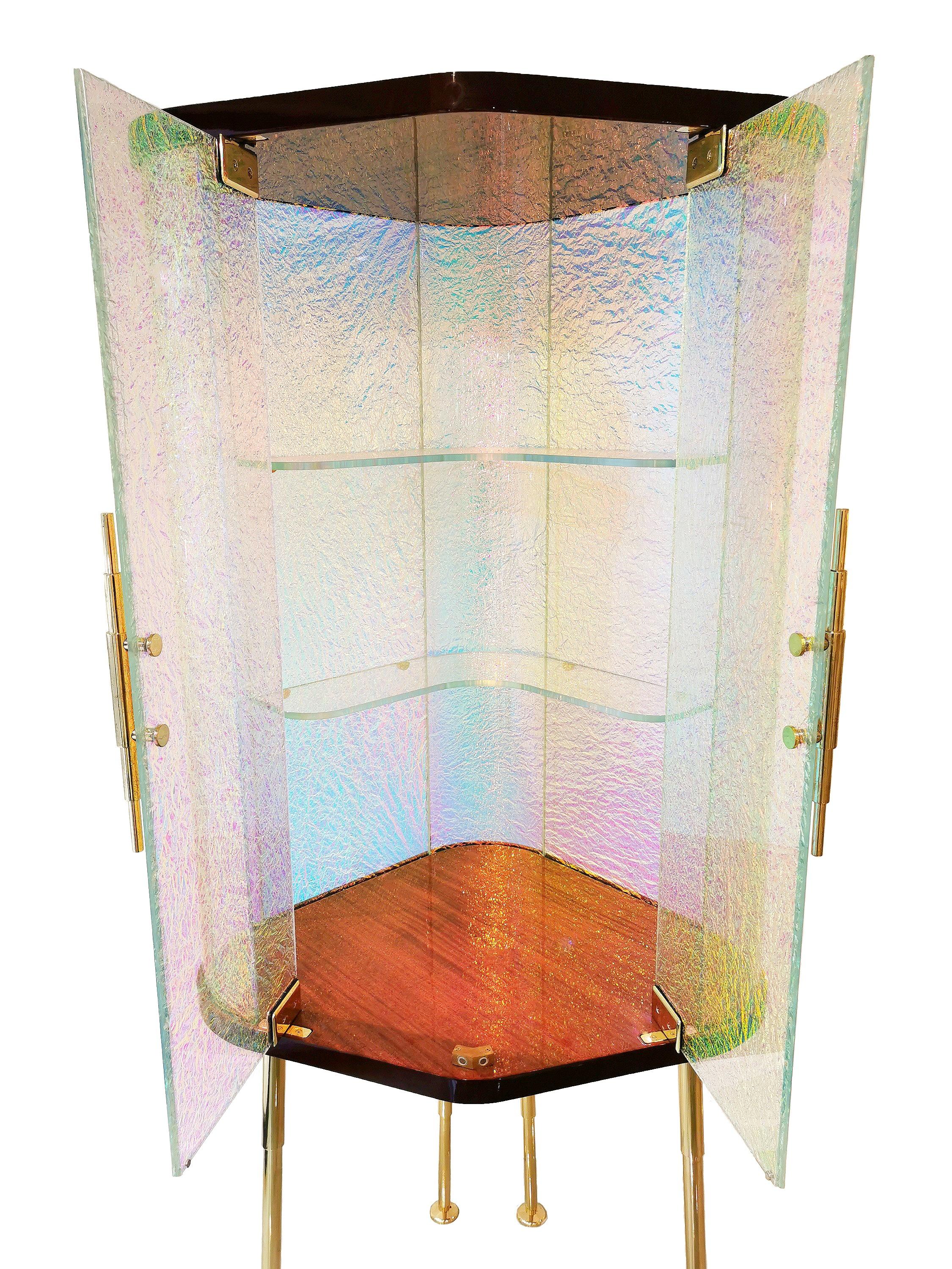 Contemporary and timeless with a touch of Art Deco. 
The Crazy Bar is hand made and designed by Troy Smith. 
Crazy Glass is a very special process, a micro interlayer of the dichroic film is sandwiched between two pieces of Starphire glass with