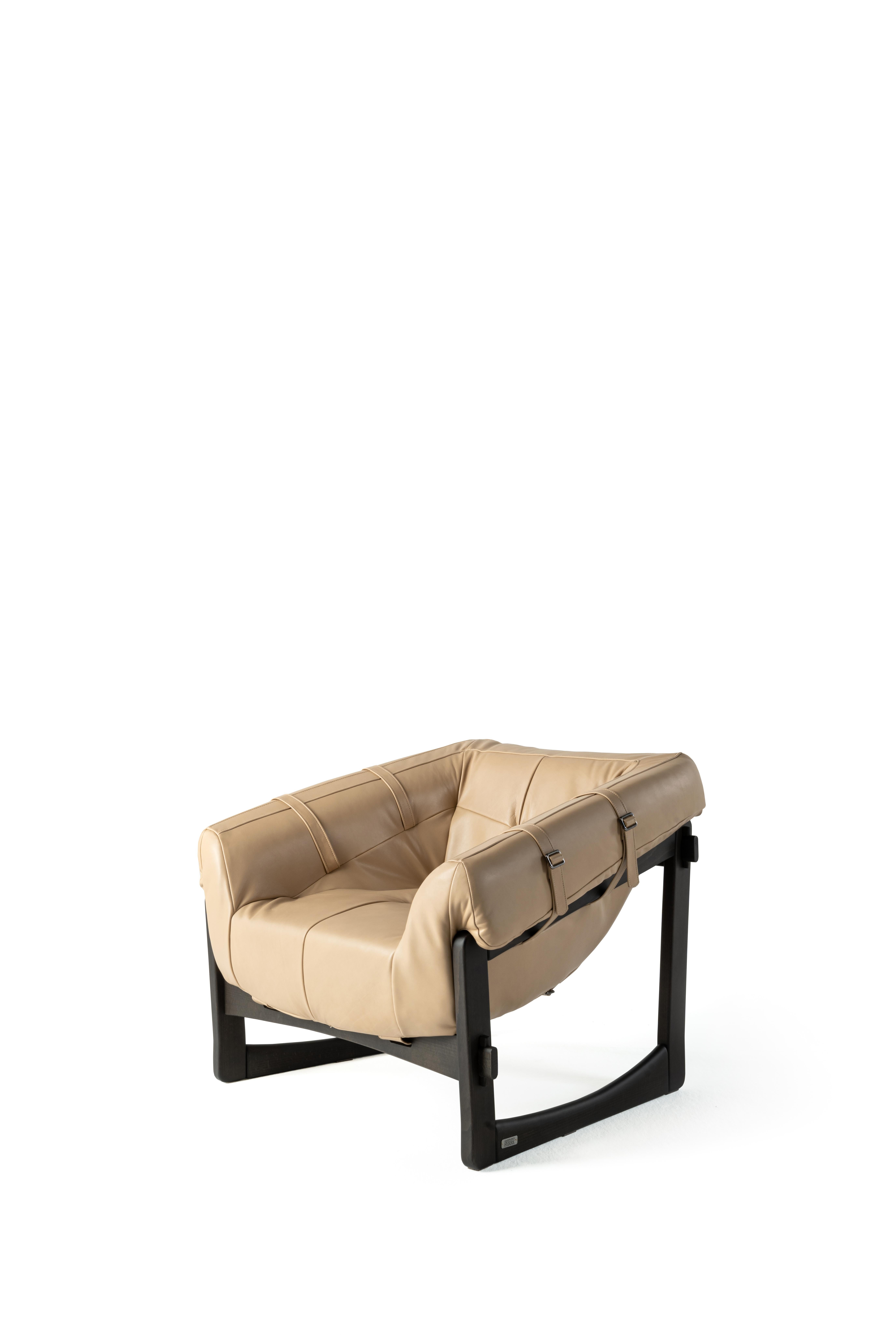 Vintage inspiration with a revisited Brazilian style for Madison armchair. The soft and enveloping shape and the structural belts that guarantee the comfort of the seat make the armchair a relaxing piece of furniture. With its bold character, the