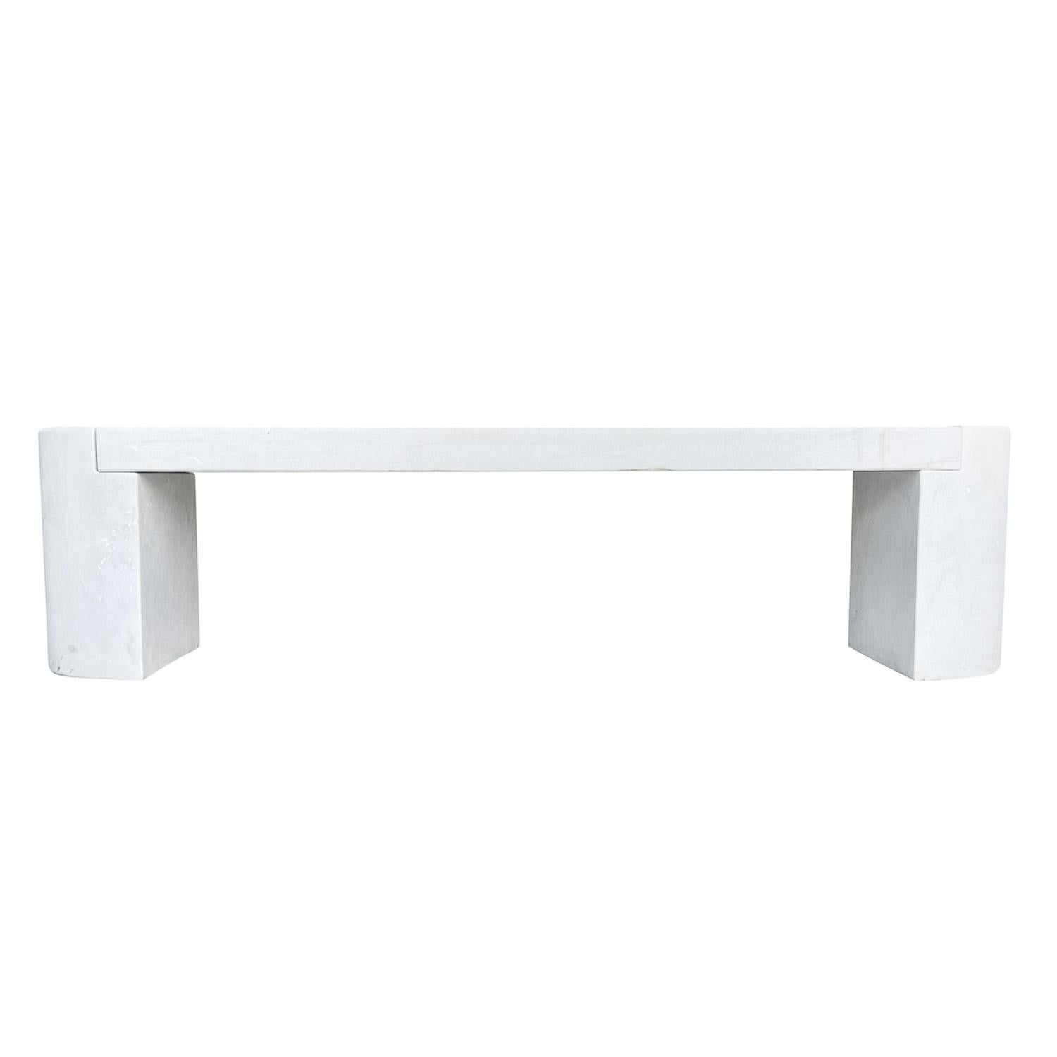 Timeless and distinct stylish garden or interior bench. The rectangular slab seat is inserted into the bases which are designed in a demi-lune shape. Hand carved in white marble with fine grey veining. Wear consistent with age and use. Circa 21st