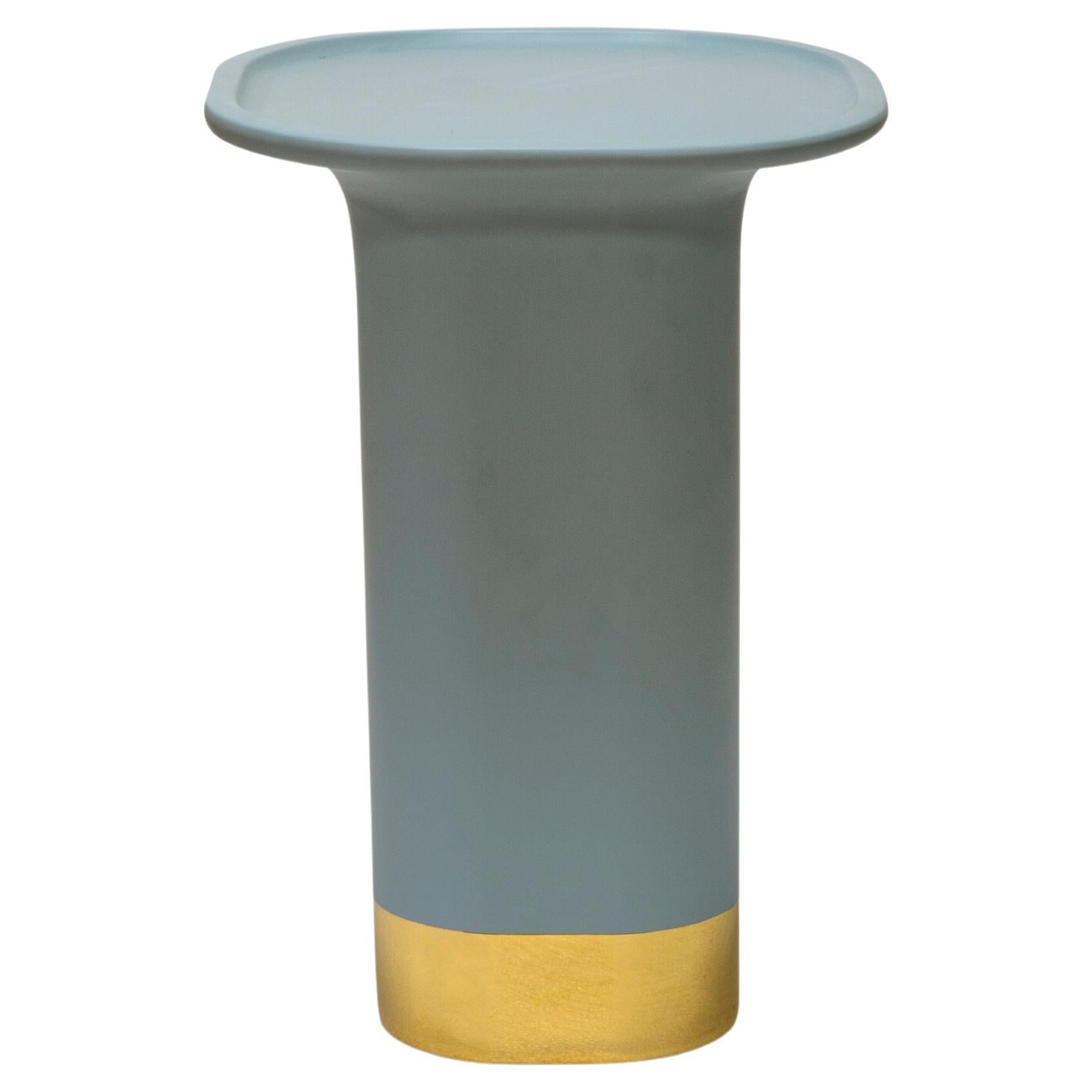 Sune L, Colorama collection
Design by Matteo Zorzenoni, product by Scapin Collezioni

Made of ceramic, the Sune side tables collection combines modern lines with particular gold or copper finishes. Sune can be personalized with or without a