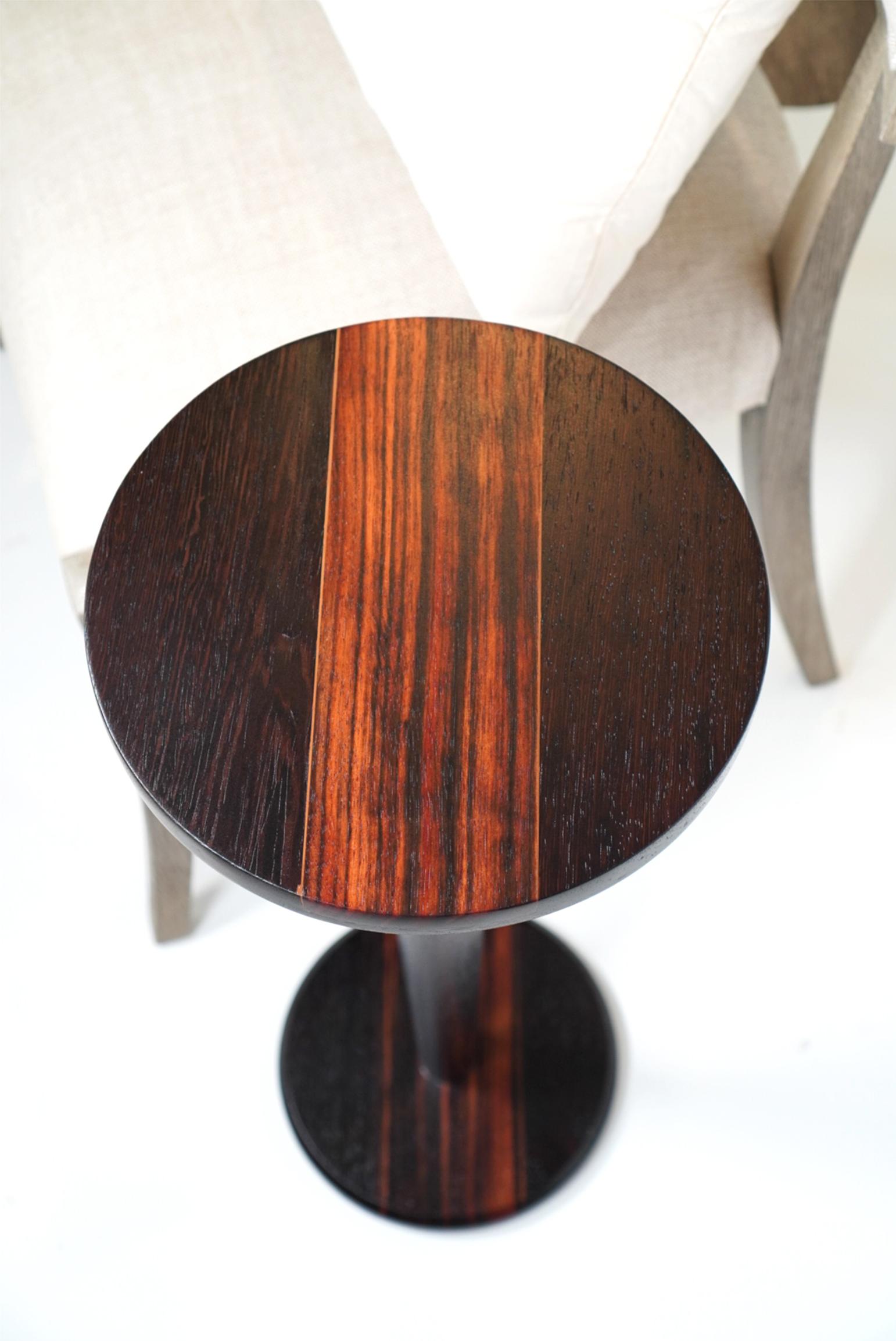 Introducing the 21st Century Mid-Century Modern Inspired Wenge and Macassar Ebony Cocktail Table, a masterpiece from the Walker Design Studios Made to Order Collection. Crafted with exotic hardwoods sourced from across the globe, this stunning piece