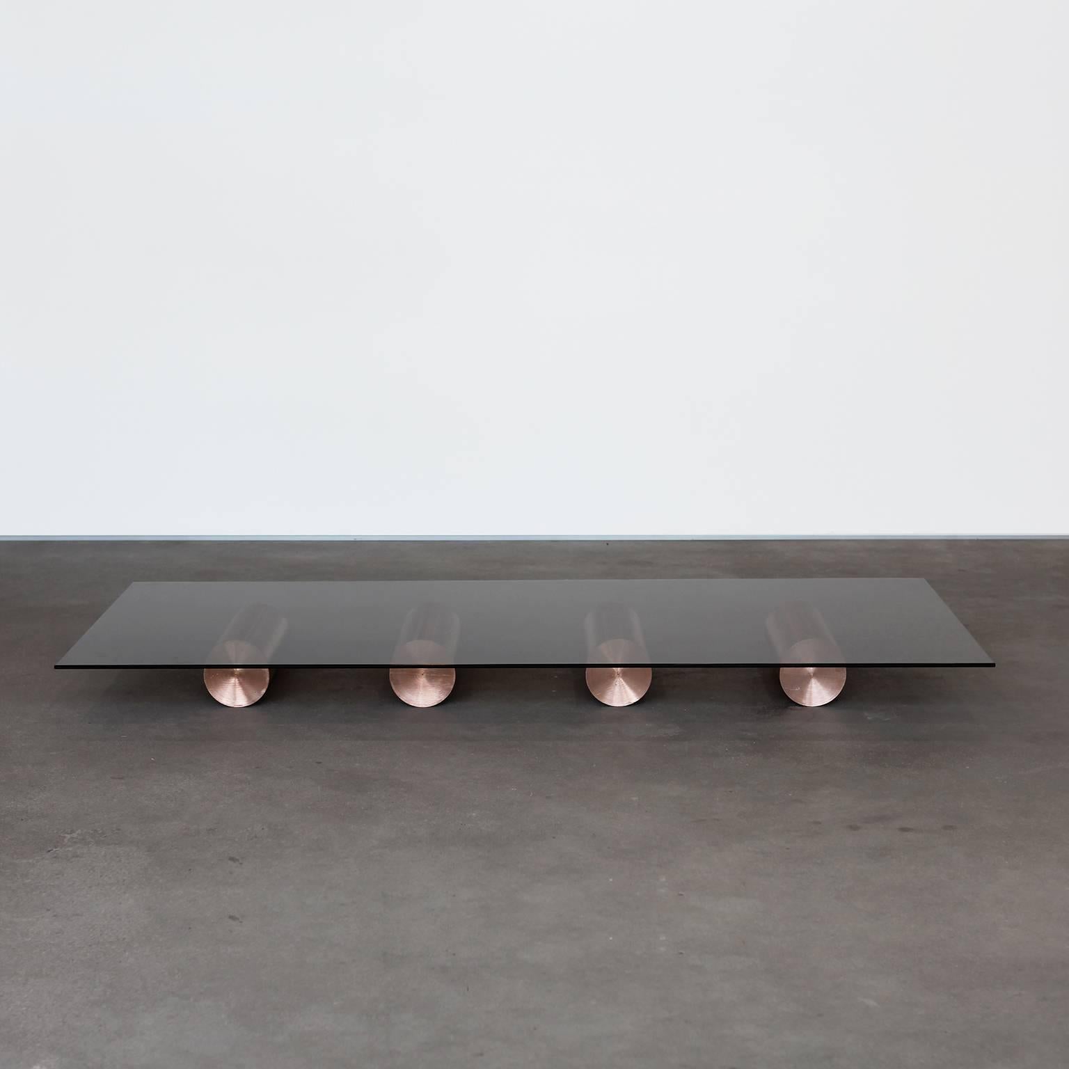 Low coffee table by Studio Dessuant Bone forms part of the Art Industrial collection a limited series of indefinable one off objects handmade by industrial workers in Kortrijk, Belgium. Each piece celebrates the materials behind the core ethos and