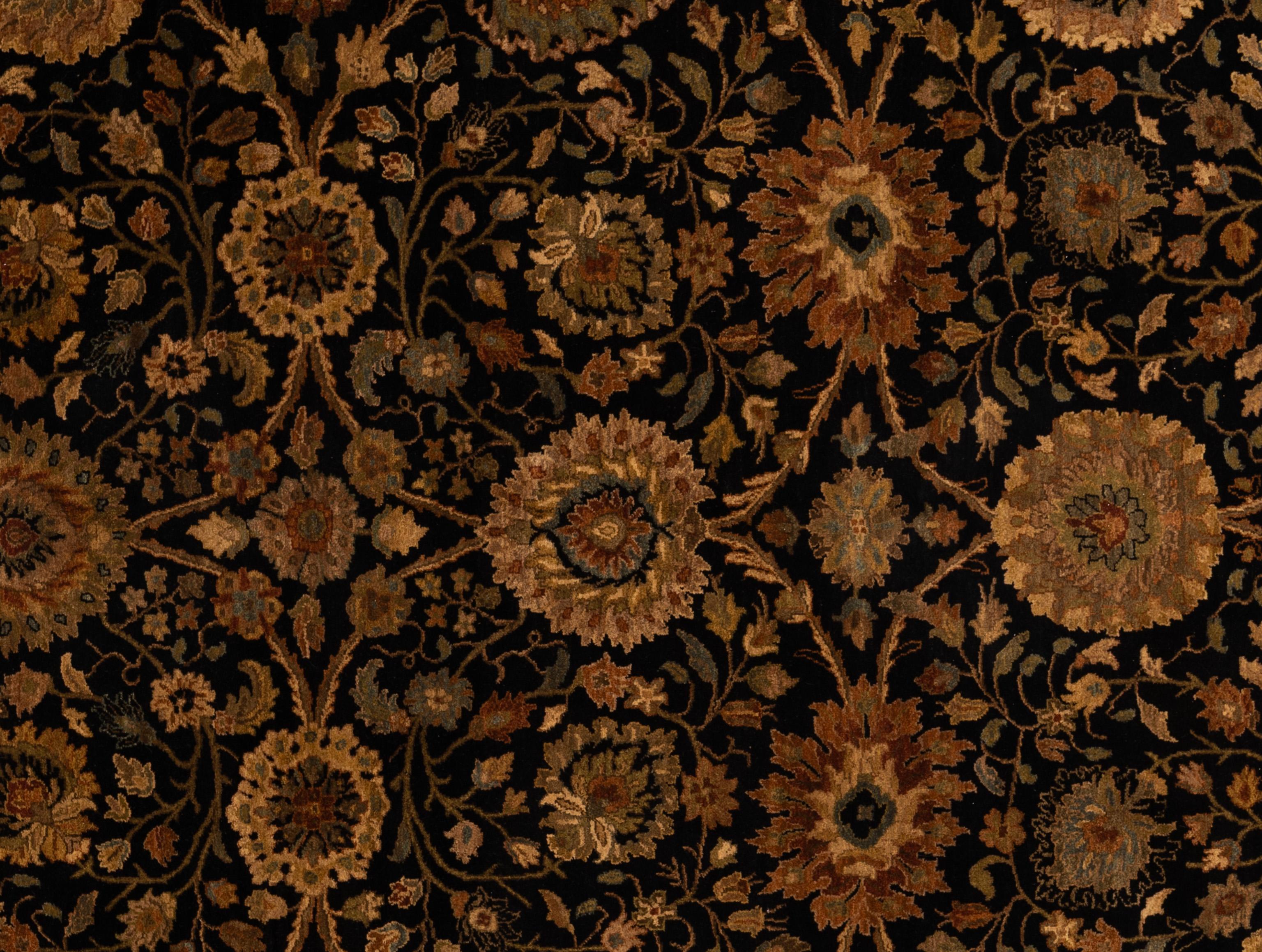 Beautifully detailed modern yet timeless Agra rug from India, featuring a decorative floral and vine pattern throughout. Handwoven by master weavers and made of 100% wool. This sophisticated rug has the perfect balance of light and dark tones making