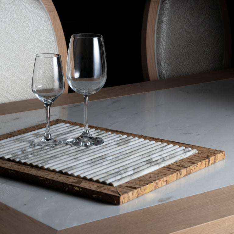 Antuã serving tray, Lusitanus Home Collection, Handcrafted in Portugal - Europe by Lusitanus Home.

A sublime serving tray, Antuã was design to uplift layback moments.

A rectangular wooden serving tray lined in natural cork with golden flecks,