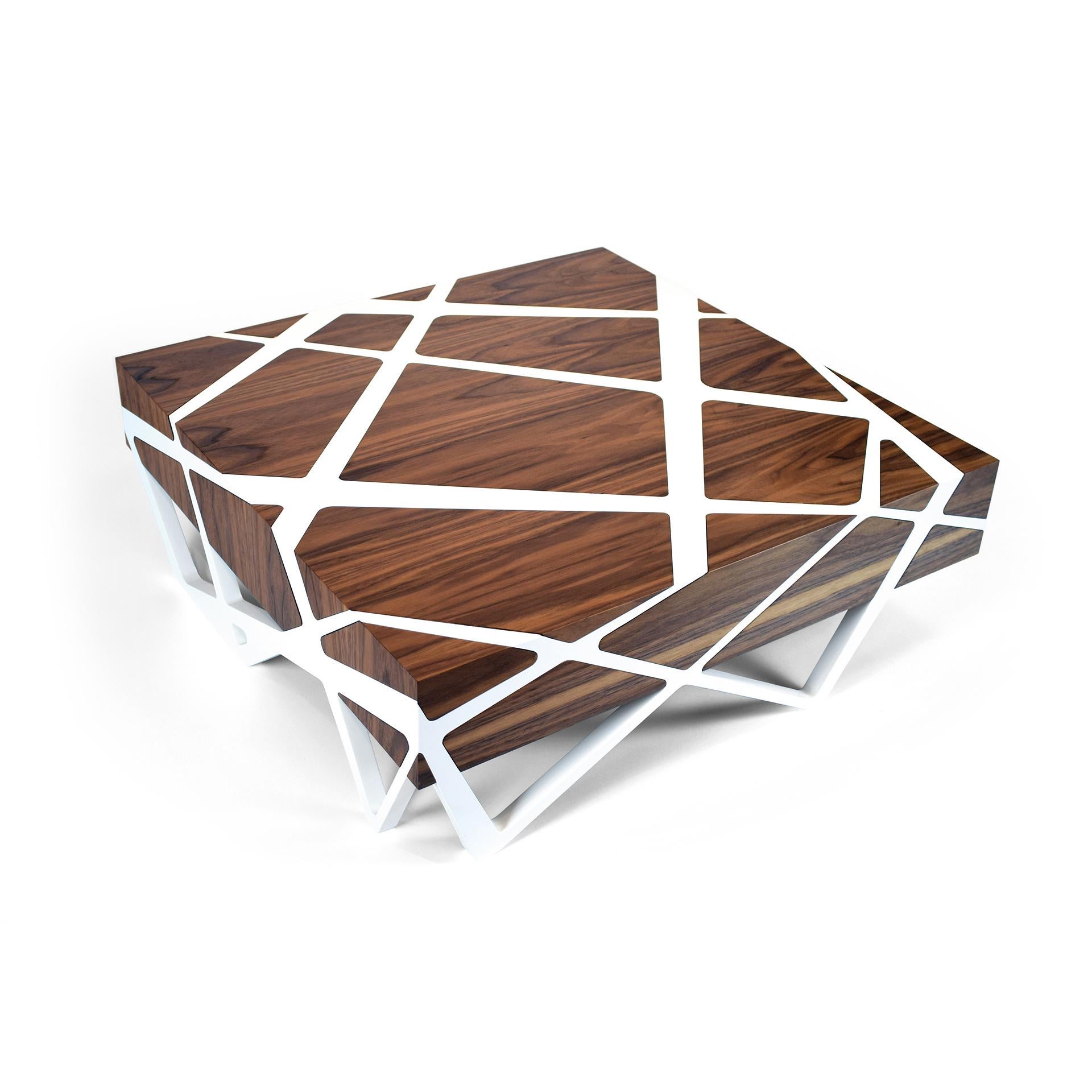 Inspired by the Sacred Ceiba trees in Havana, this elegant coffee table is handcrafted with carefully selected walnut wood veneer and white lacquered wood.

The 