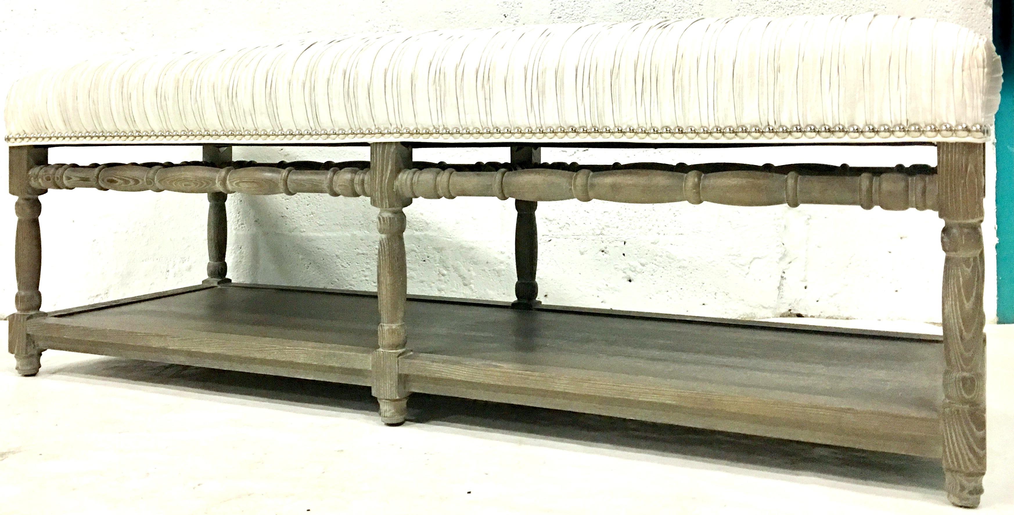 21st Century Modern cerused wood custom upholstered silver metallic silk bench. This new bench features a cerused driftwood wash finish with new upholstery grade 