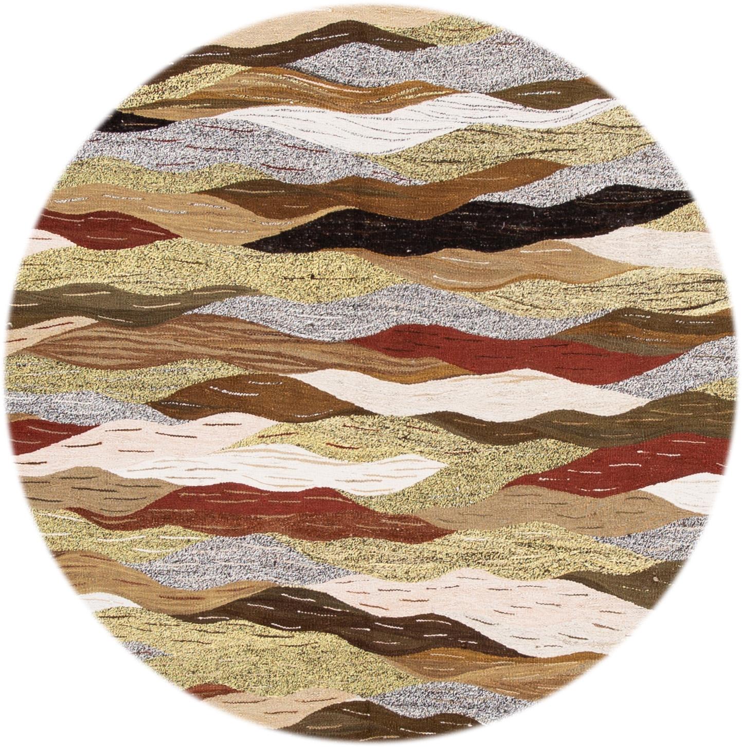 Beautiful hand knotted modern Kilim rug with an ivory field, and multi-colors accents an all-over design.
This rug measures: 9'0
