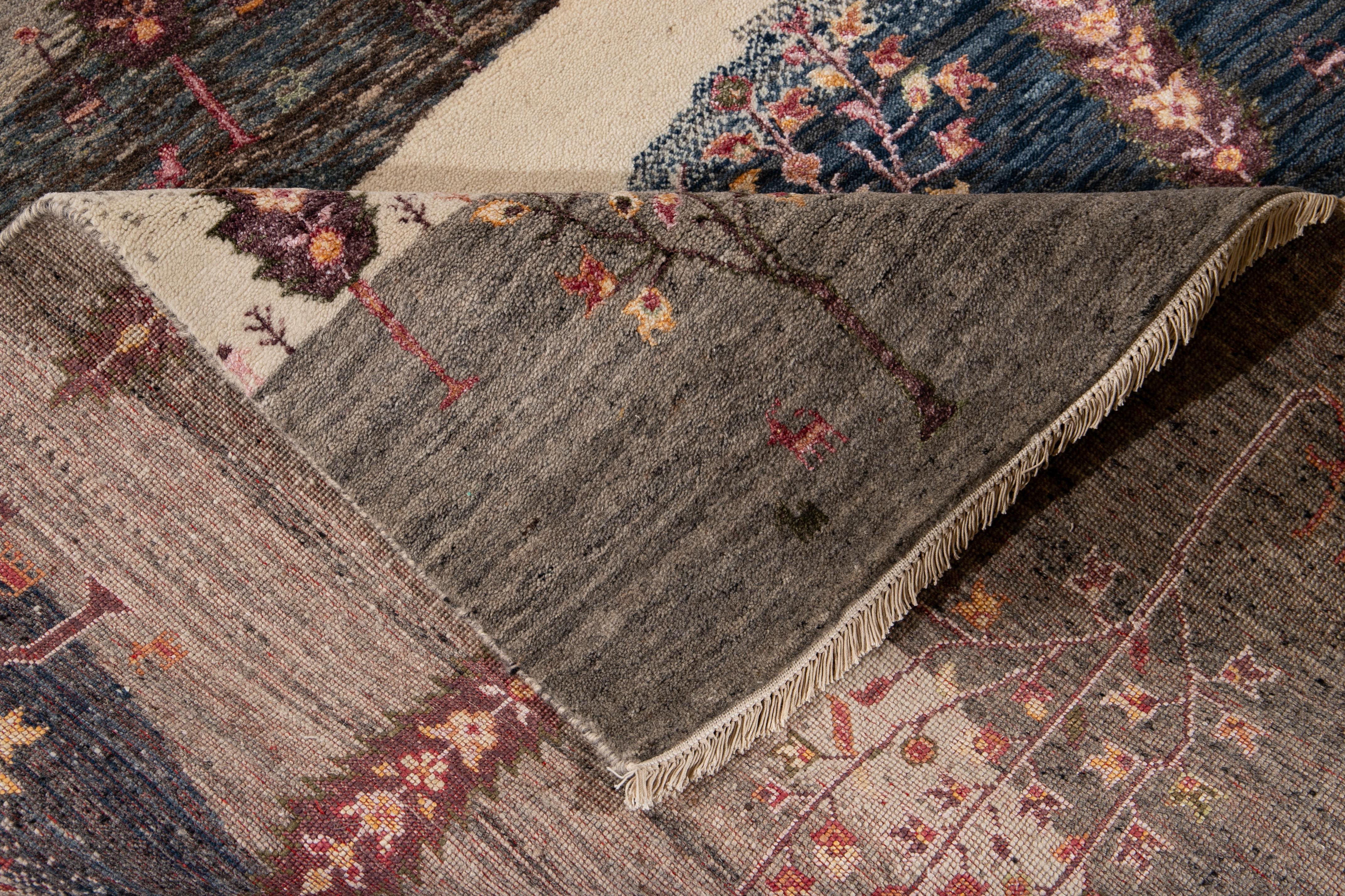 Schöner zeitgenössischer Gabbeh-Designteppich mit elfenbeinfarbenem Feld und schönem mehrfarbigen Allover-Muster. 

Dieser Teppich misst 8'9