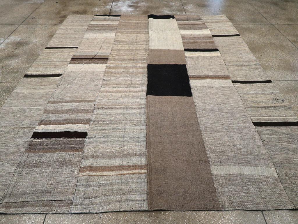 A modern Turkish flatweave Kilim room size carpet handmade during the 21st century.

Measures: 9' 7