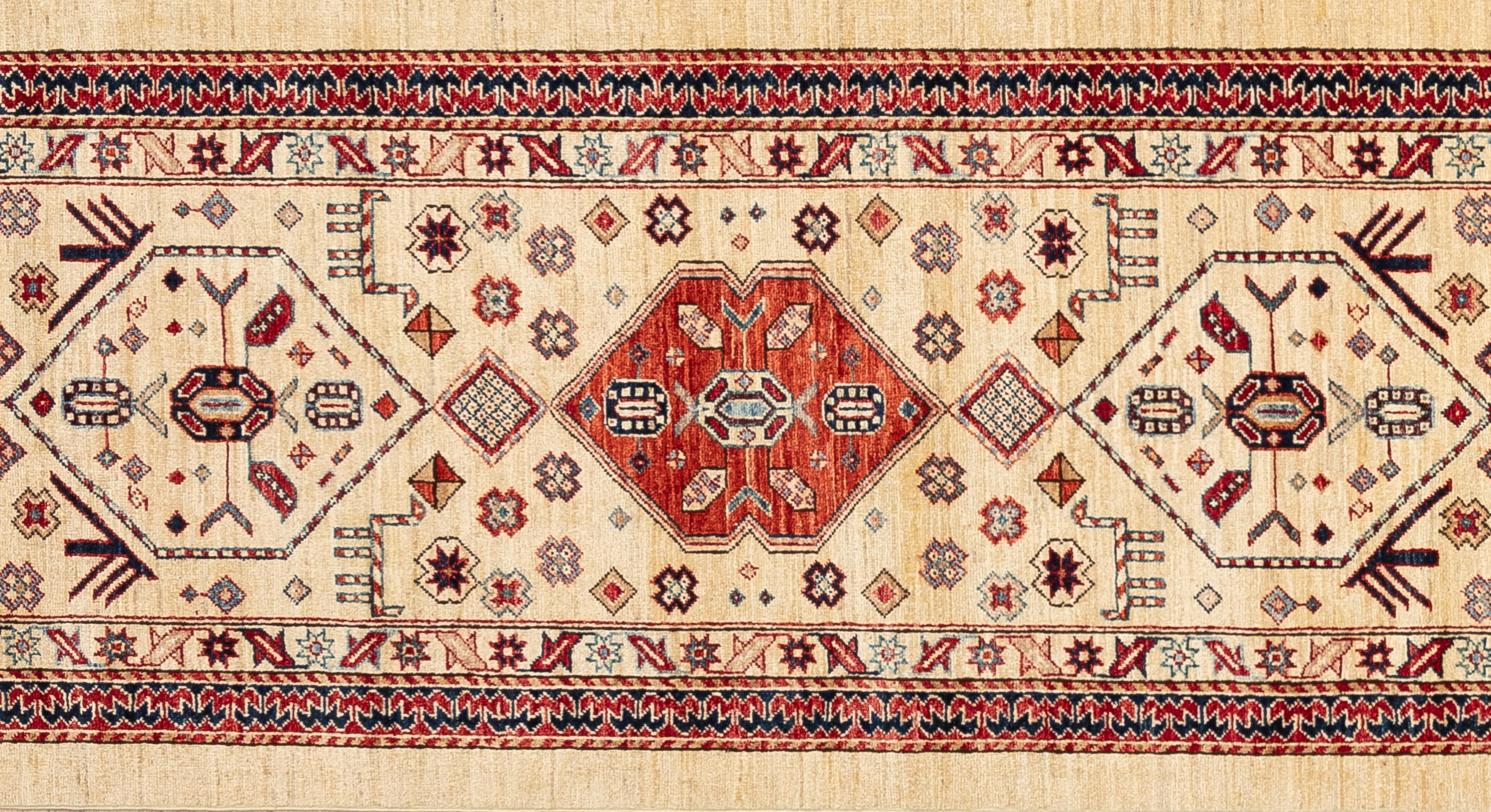 Handwoven with 100% handspun wool, this light and bright Kazak rug is inspired by Caucasian carpets. Its all over tribal design in unique coloring of cranberry and deep mahogany makes this rug a must have. 

Size - 3'1