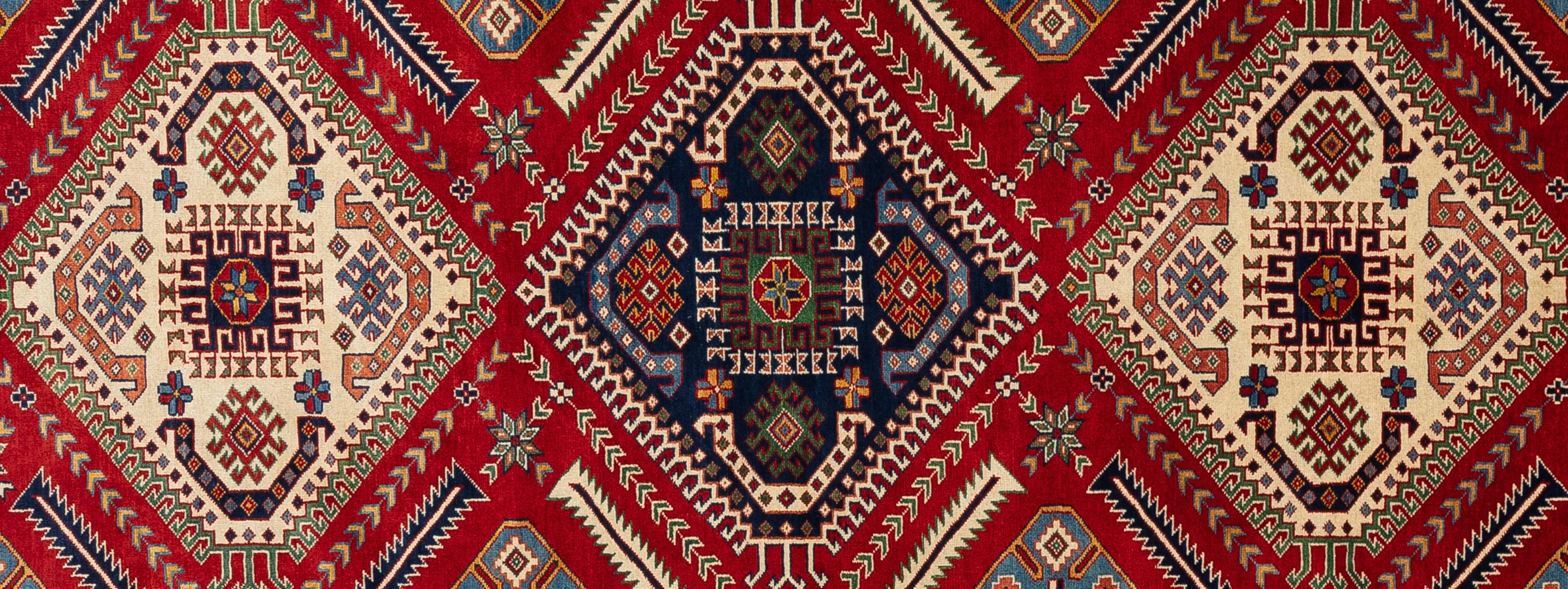Handwoven with 100% handspun wool. This stunning Kazak rug is inspired by Caucasian carpets, its all over tribal design and unique coloring makes this rug a must have. 

Size - 7'3