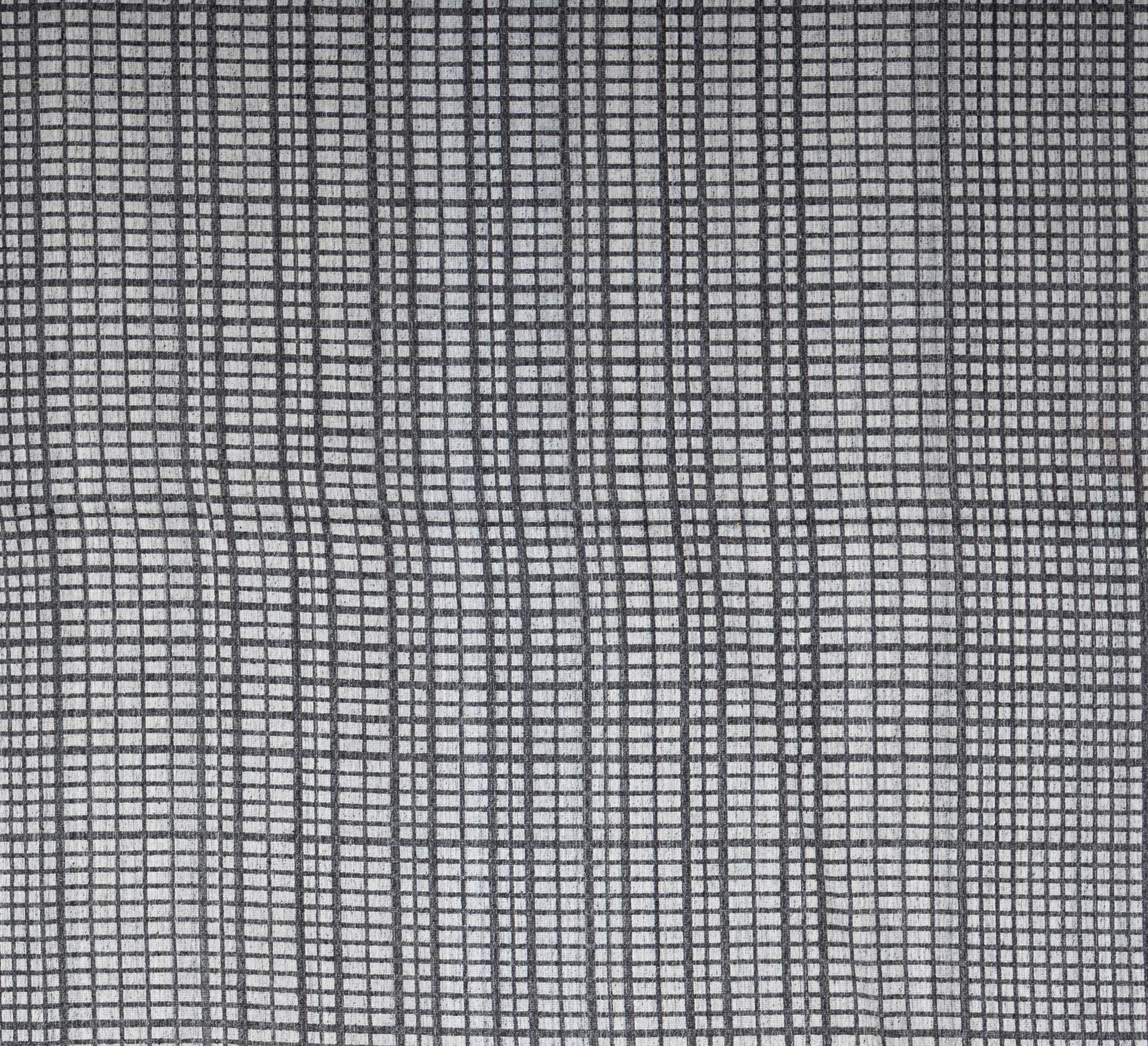 Bold, flatwoven, and effortlessly stylish, this modern kilim rug brings a fresh perspective to a time-honored weaving tradition. Handcrafted using 100% wool, the rug features a low-profile, lightweight construction with the crisp geometry and