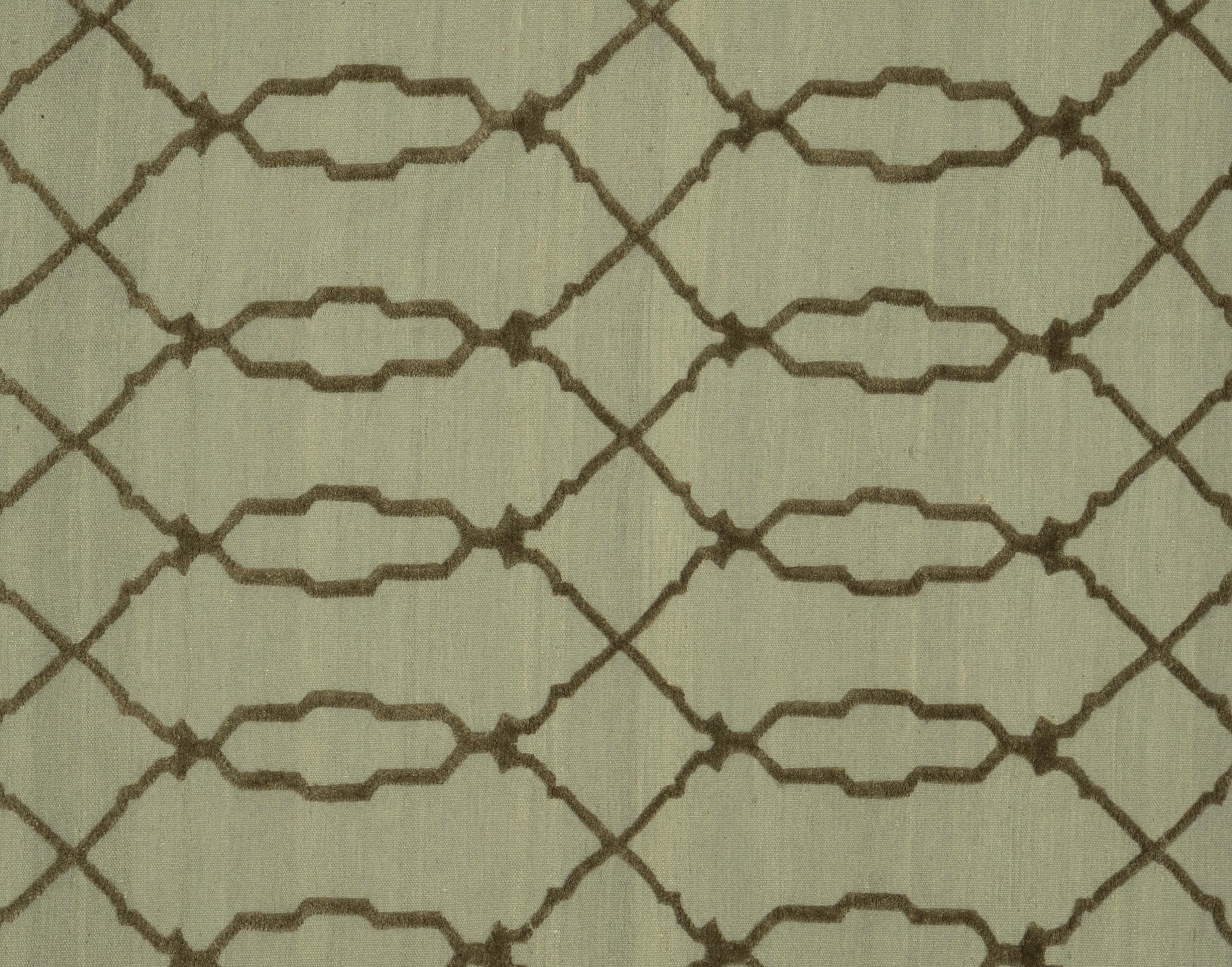 Ce tapis Rug & Kilim n'est pas seulement un élément de décoration, c'est une tapisserie culturelle tissée d'histoires et d'héritage. Chaque motif et dessin est le reflet de la riche tapisserie de la culture indienne, s'inspirant de traditions