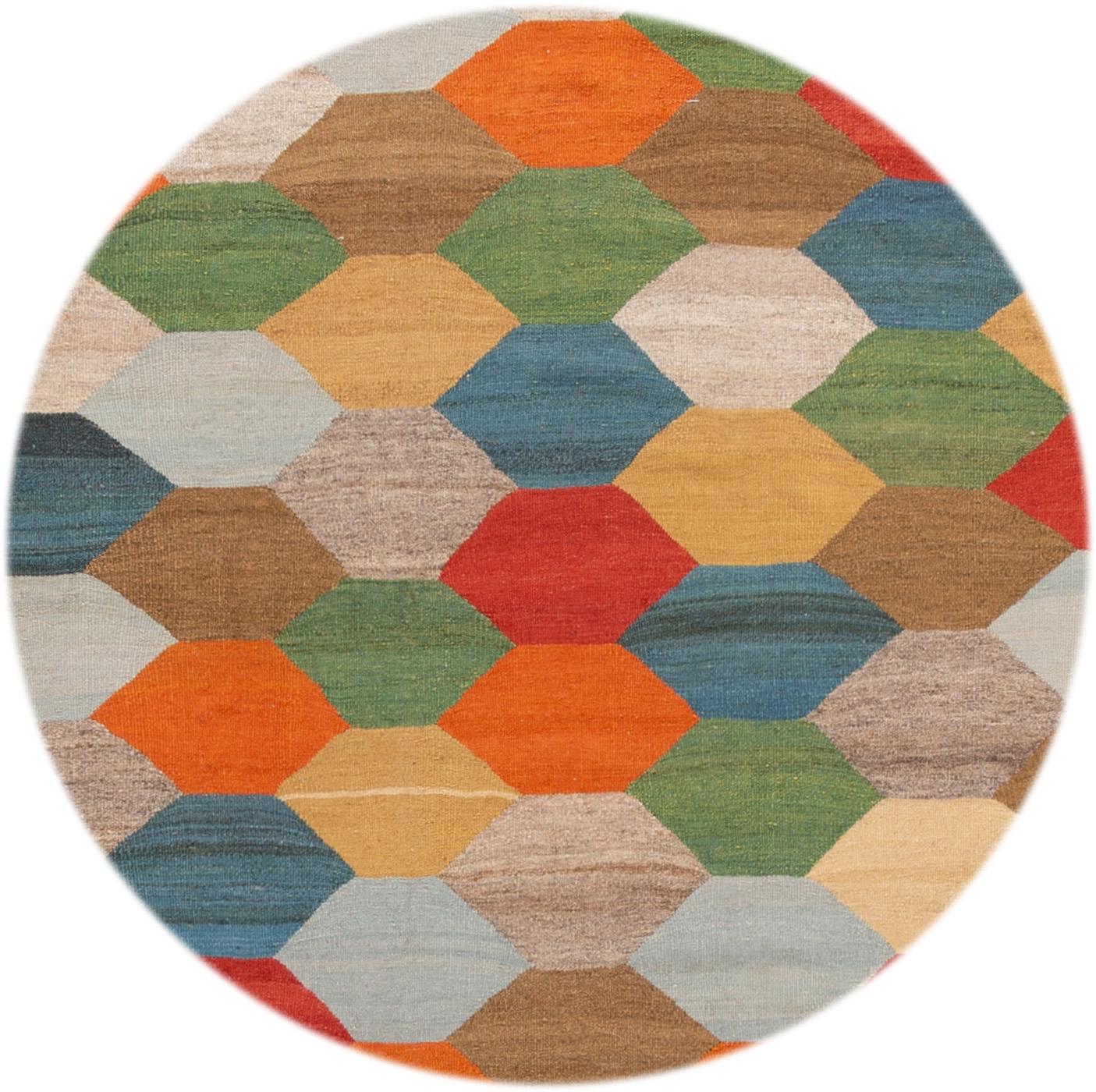Beautiful hand knotted modern wool Kilim rug. This rug is multicolored in an all-over geometric design.

This rug measures: 8'5