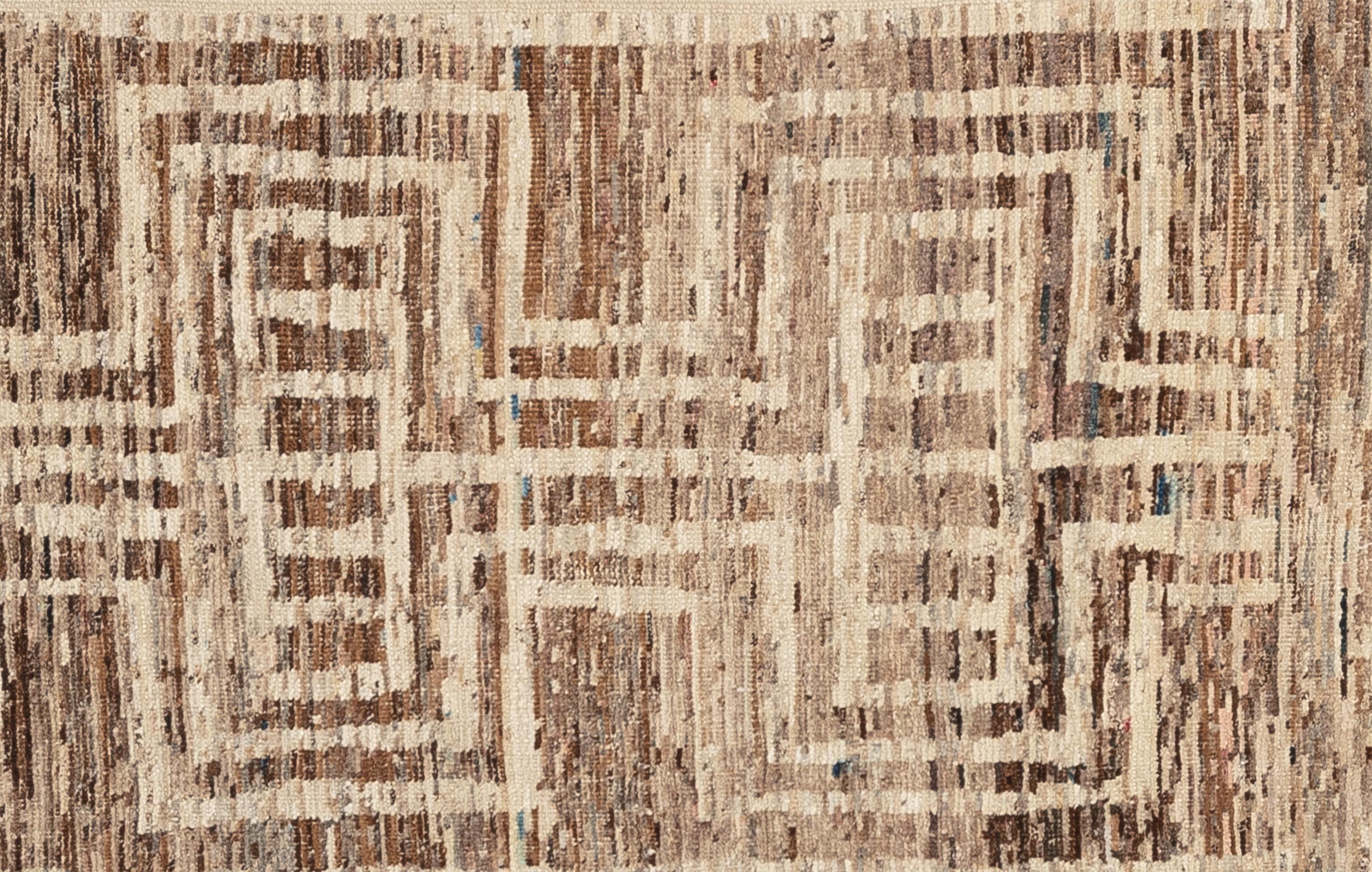 Handwoven with 100% handspun wool, in the mountains of Afghanistan; this beautiful naturally dyed Moroccan rug is truly one-of-a-kind. Moroccan rugs tend to be simple and are the perfect compliment for your décor. From minimalist modern to