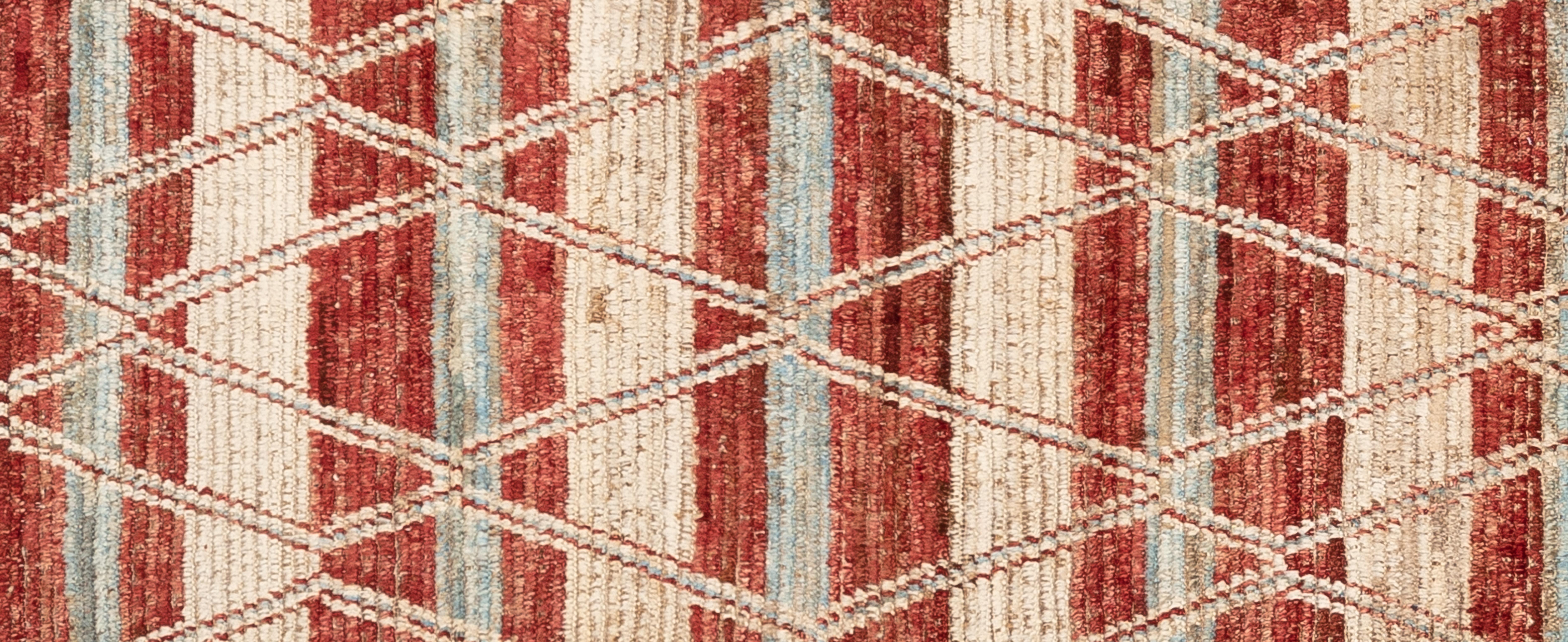 Handwoven with 100% handspun wool, in the subtropical woodlands of Pakistan; this beautiful naturally dyed Moroccan rug is truly one-of-a-kind. Moroccan rugs tend to be simple and are the perfect compliment for your décor. From minimalist modern to