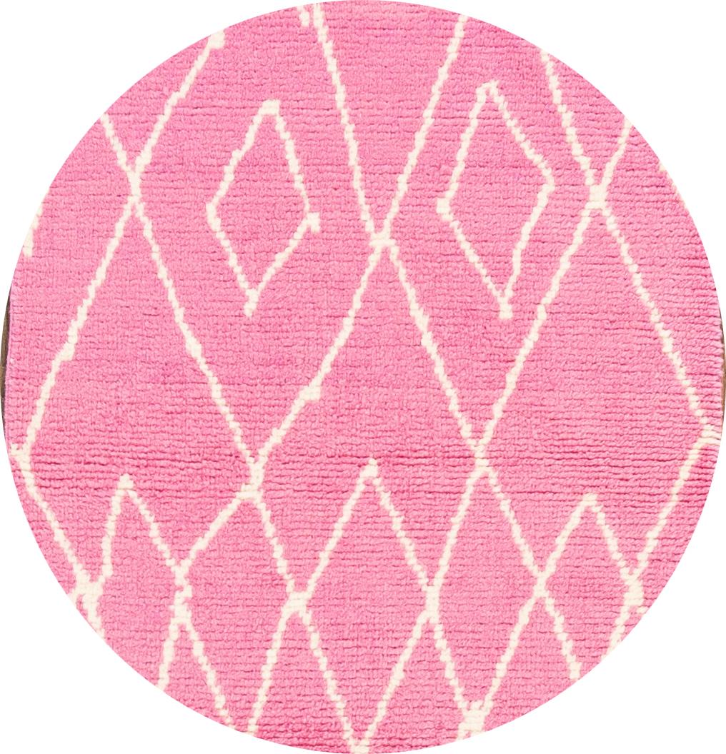 Beautiful contemporary Moroccan-style runner rug, hand knotted wool with a pink field, ivory accents in a gorgeous all-over tribal design.

This rug measures 3' 1