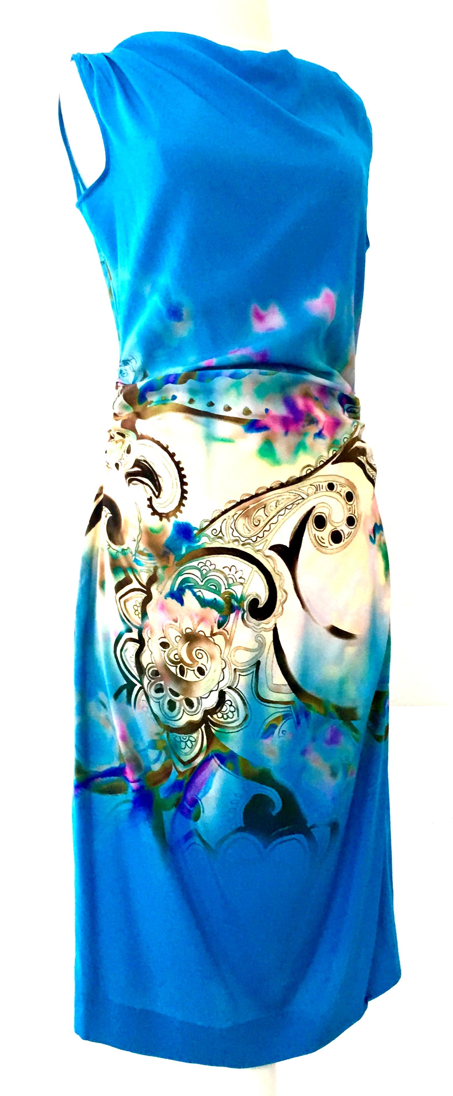21st Century Modern & New Italian 100% Silk Print Shift Dress By, Etro. This silk turquoise with paisley and abstract print dress is new with original manufacturer and retail tags present. It features a vivid turquoise ground with a paisley and