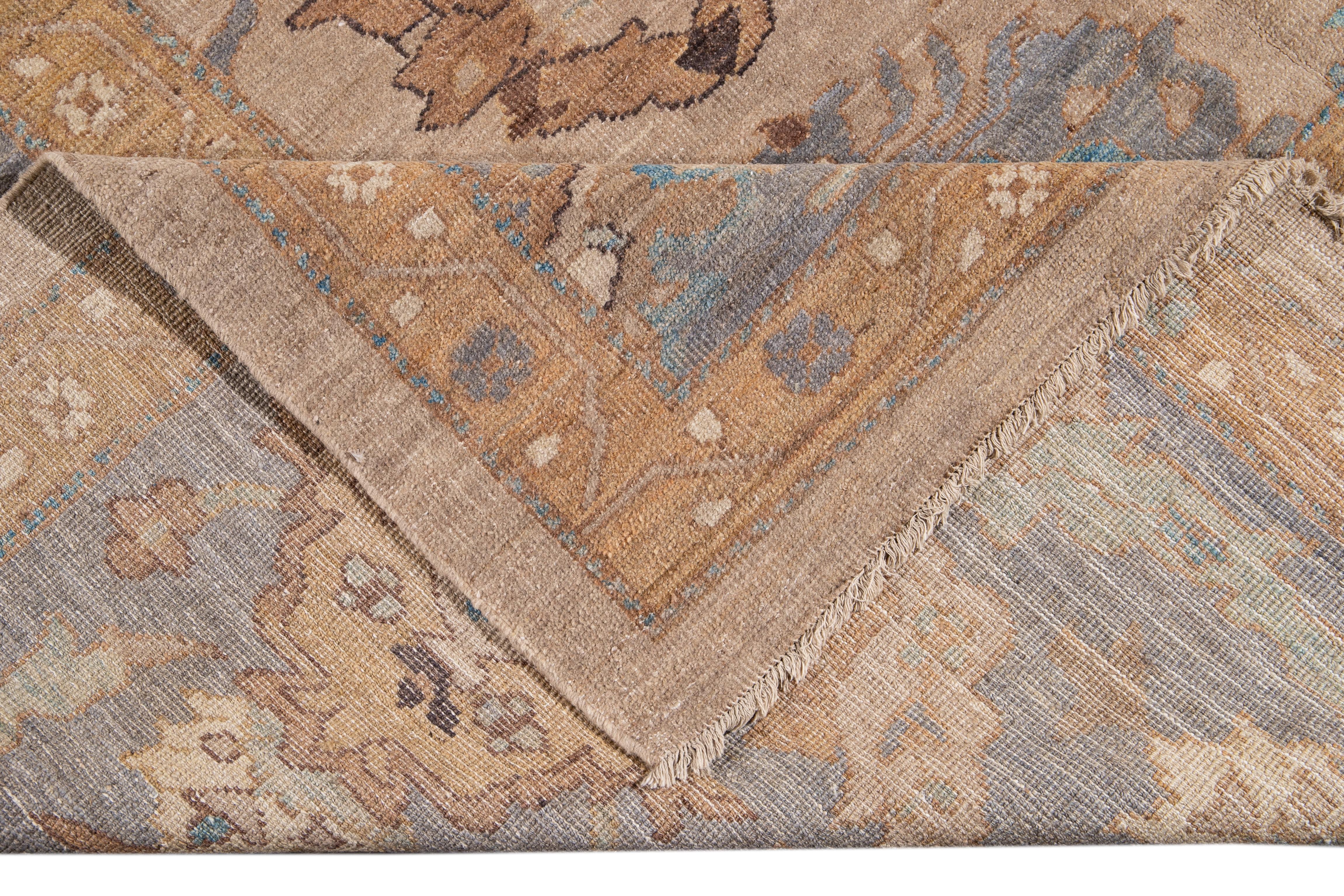 Beautiful modern Sultanabad hand-knotted wool rug with a tan field. This Sultanabad rug has gray accents in a gorgeous all-over Classic floral pattern design.

This rug measures: 13' x 19'3