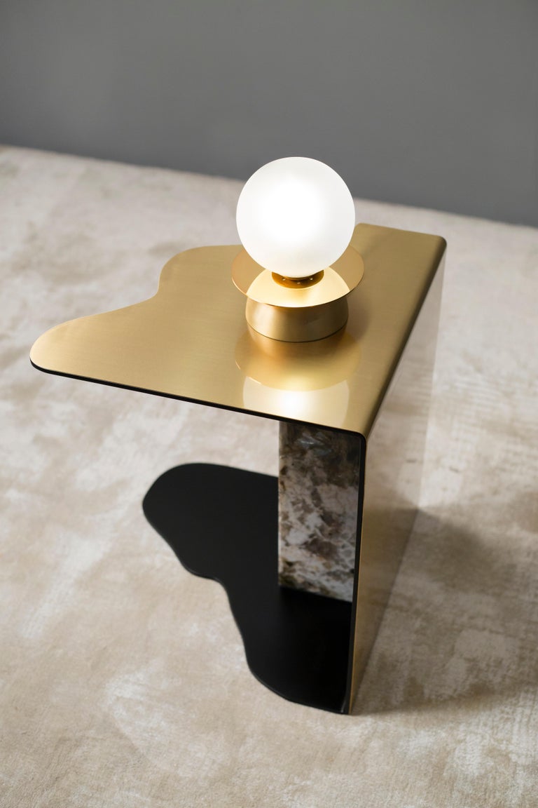 21st century modern Raw side table brushed brass patagonia granite handcrafted in Europe by Greenapple

Raw side table materials
Metal side table outer shell in brushed brass with a high-gloss finish and inner shell lacquered in satin black.
Base