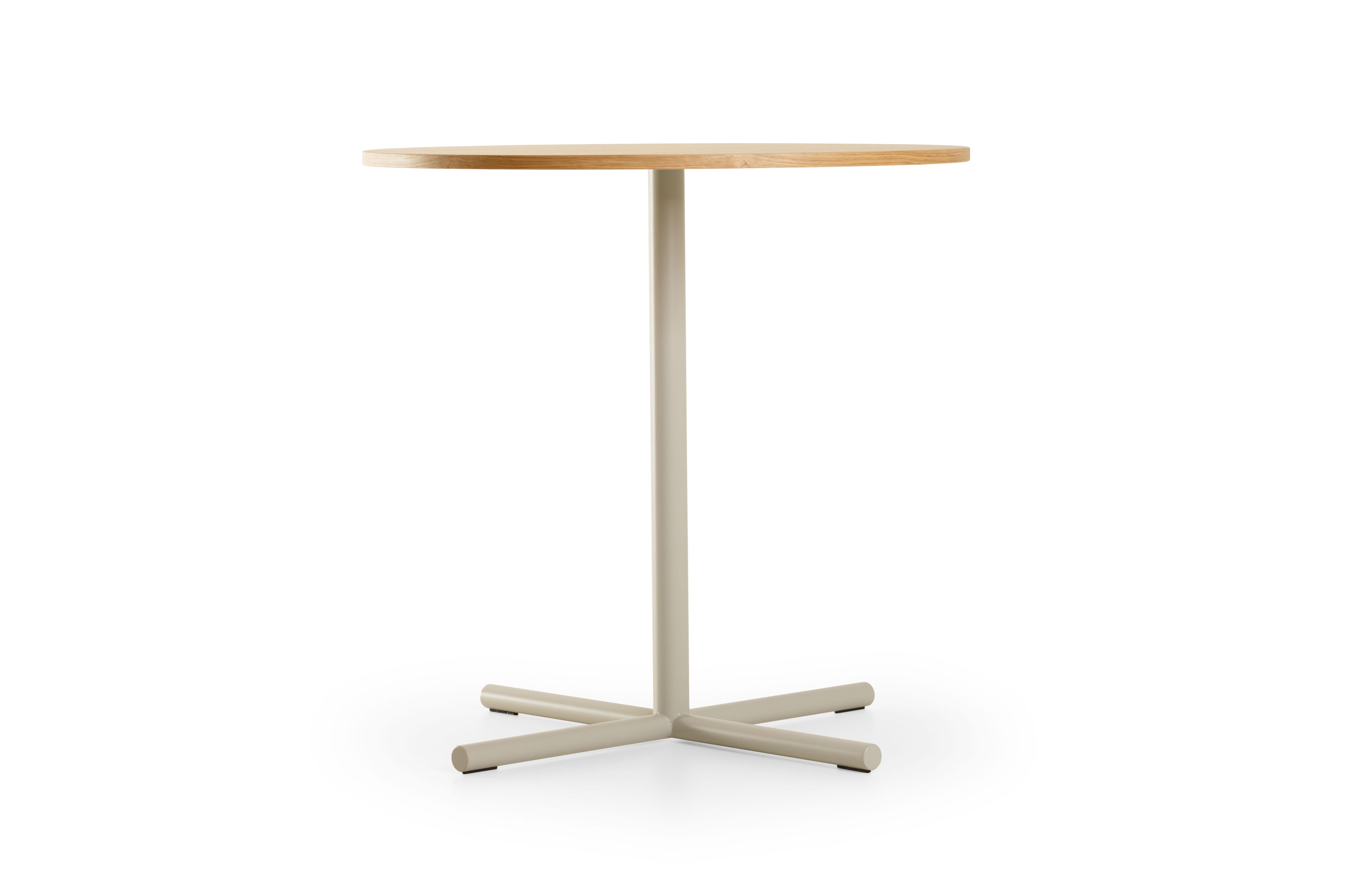 Table, side table or coffe table? That's why they're called Notable. You don't need to wonder, just use them to figure out. 

A long central steel leg, a cross base for greater stability and the tops, interchangeable, modular and with a wide range